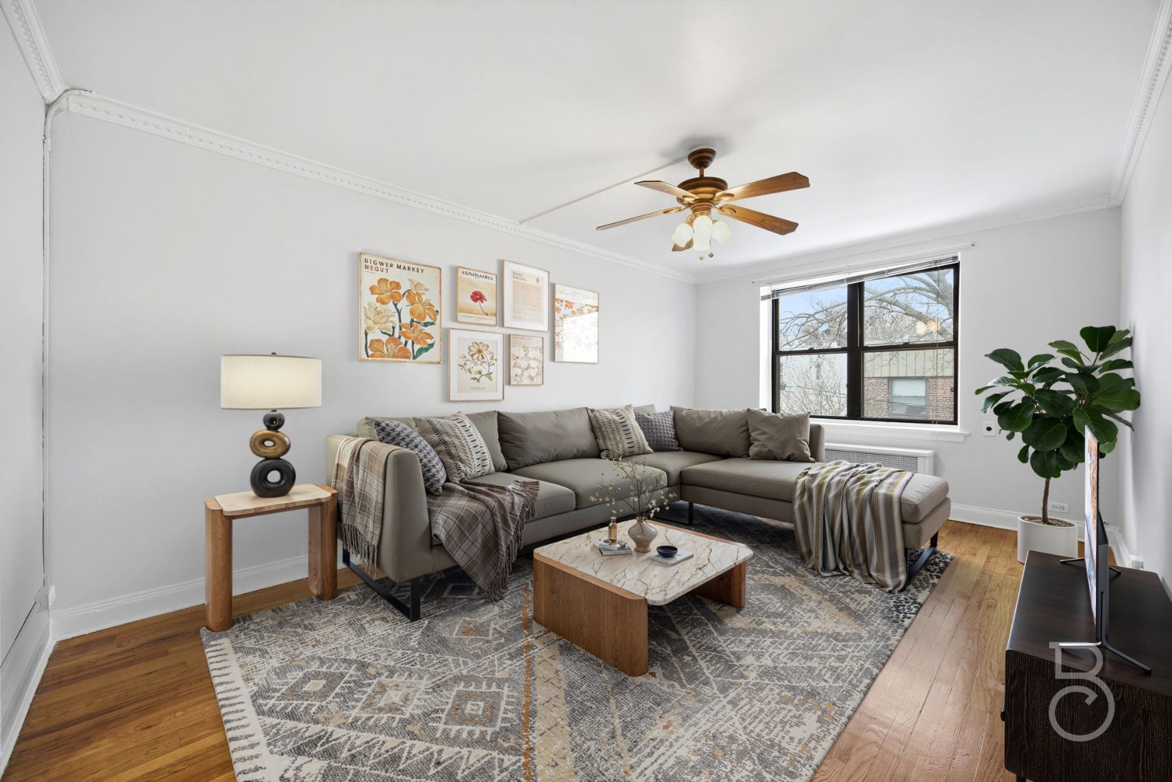 a living room with furniture a chandelier and a window