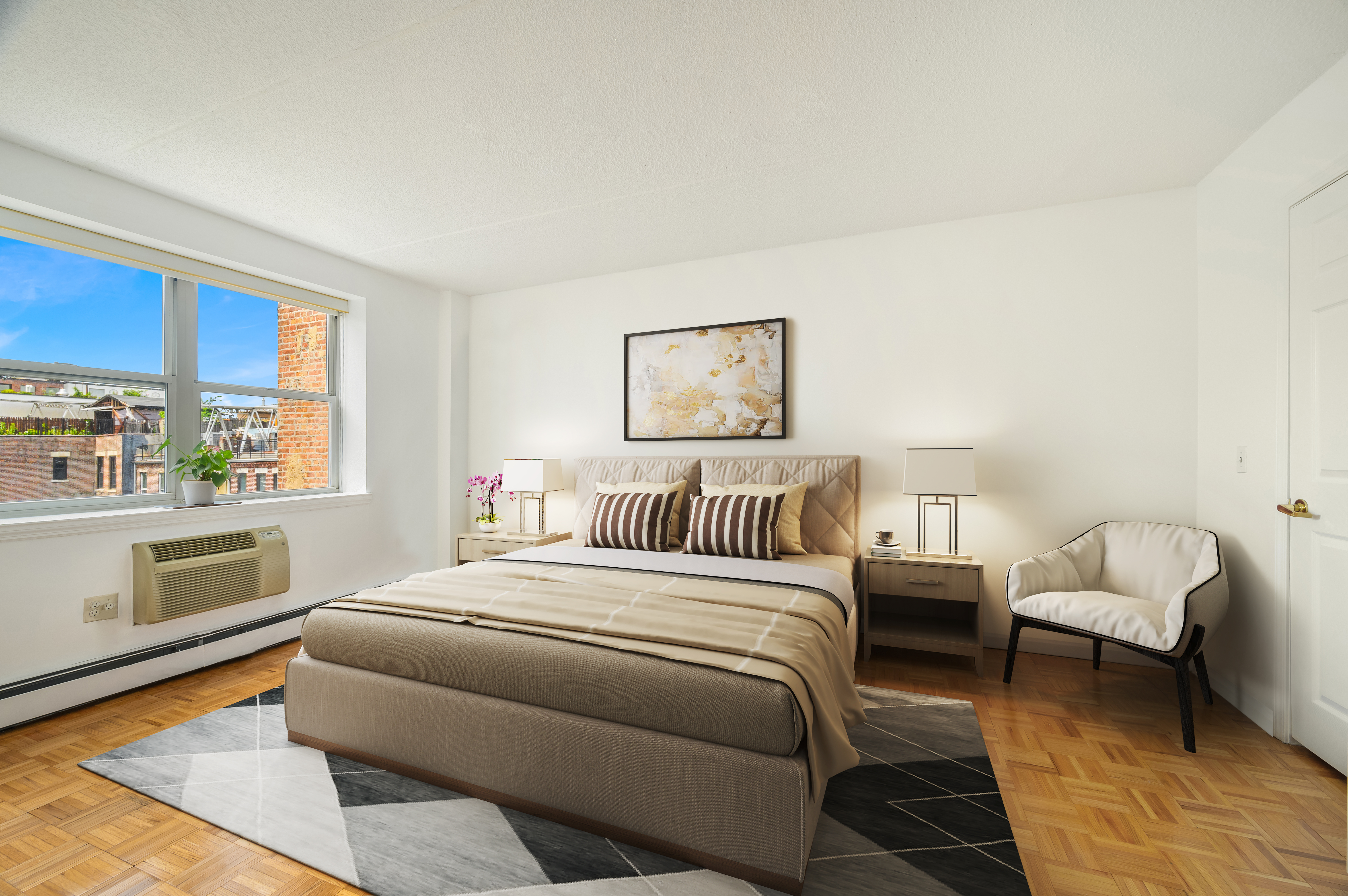 101 West 117th Street, Unit 5E Manhattan, NY 10026 - Photo 3 of 8 a bedroom with a bed and a couch