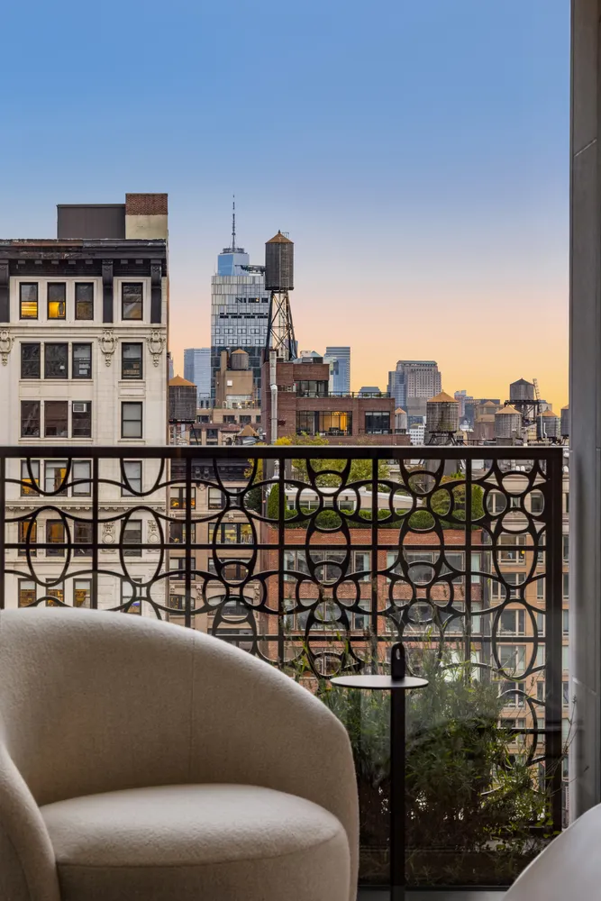 a view of a balcony with city view