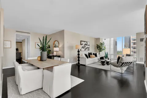 a view of a living room and dining room