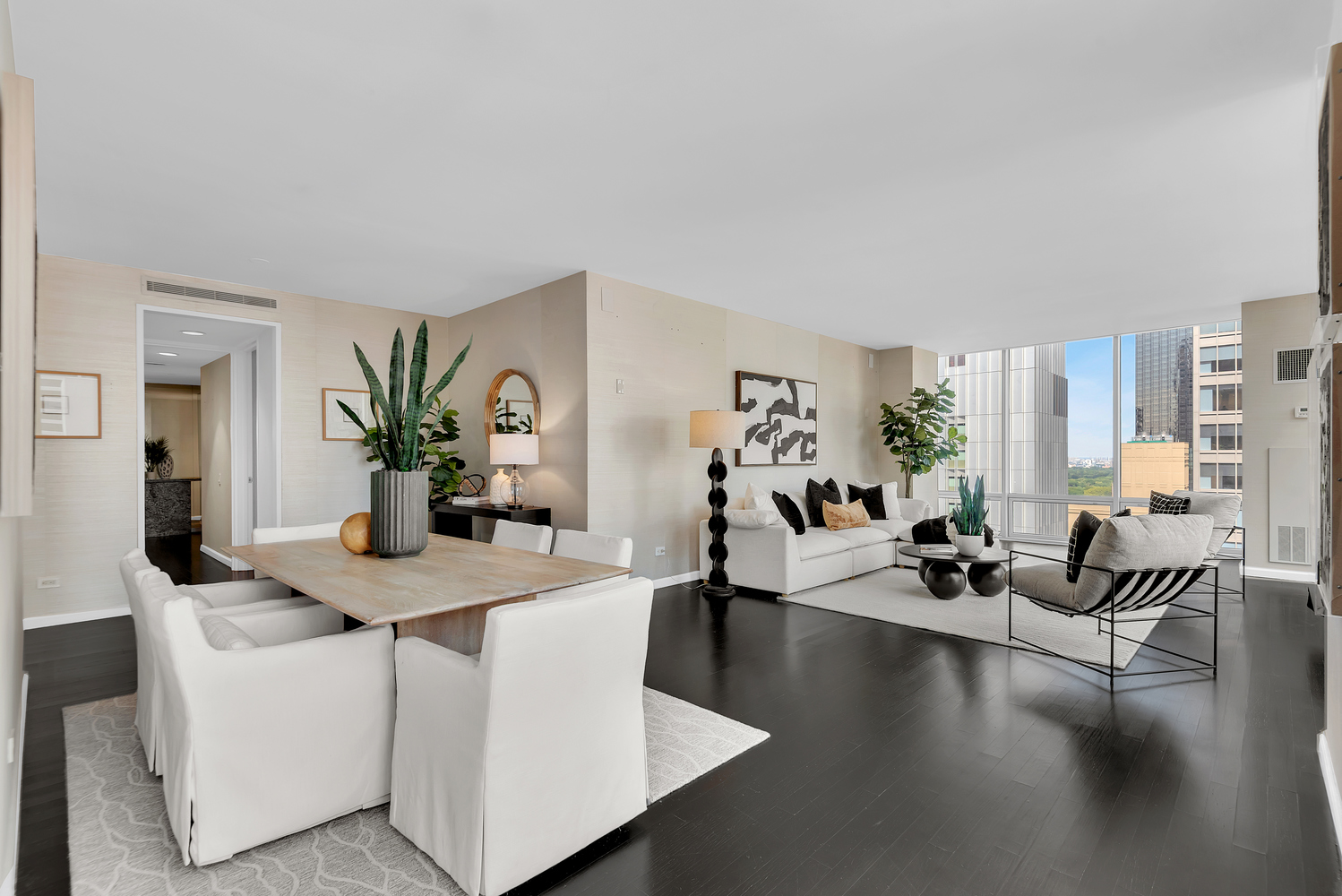 641 5th Avenue, Unit 26D Manhattan, NY 10022 - Photo 3 of 13 a view of a living room and dining room