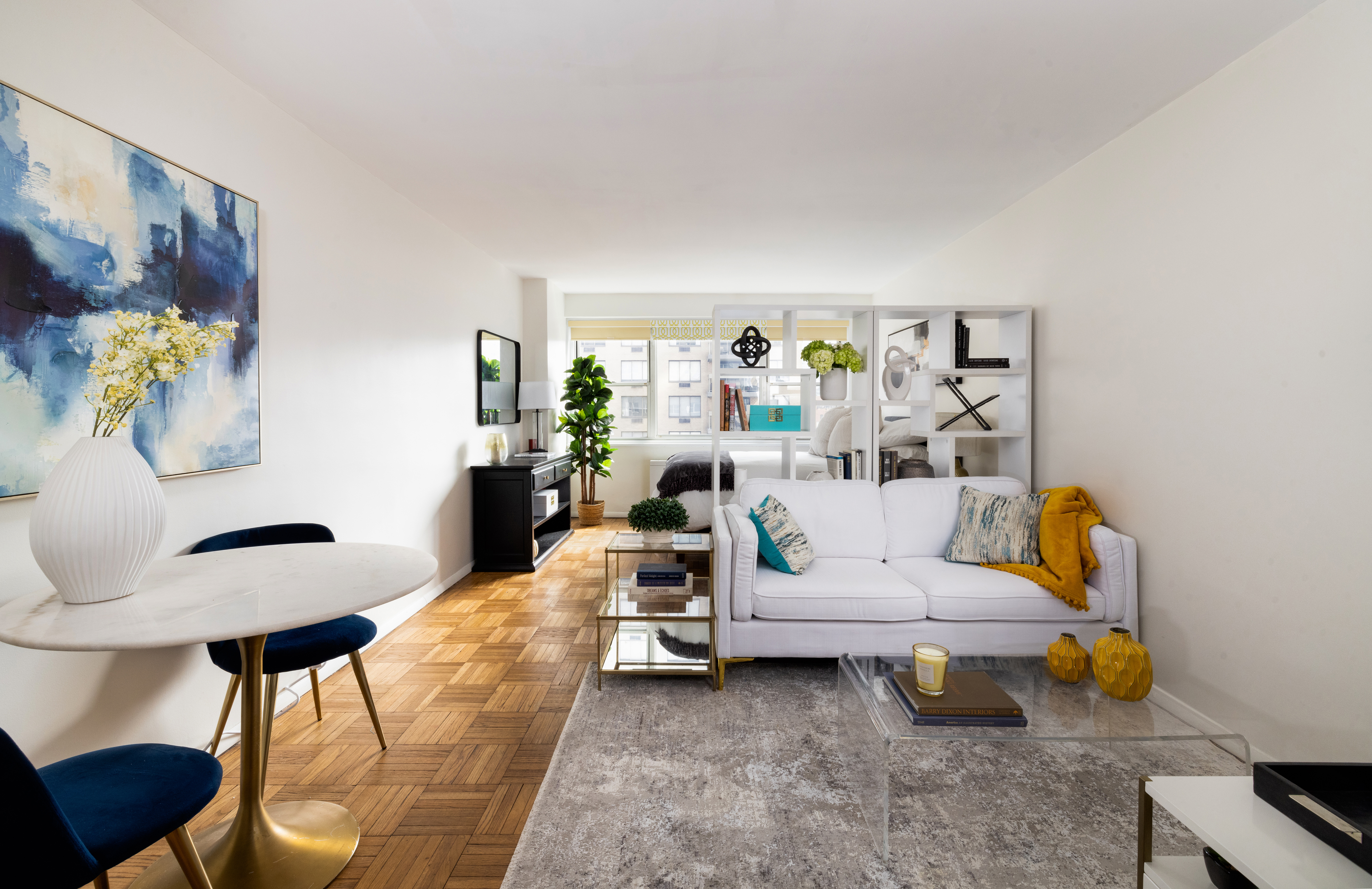 a living room with furniture and a table