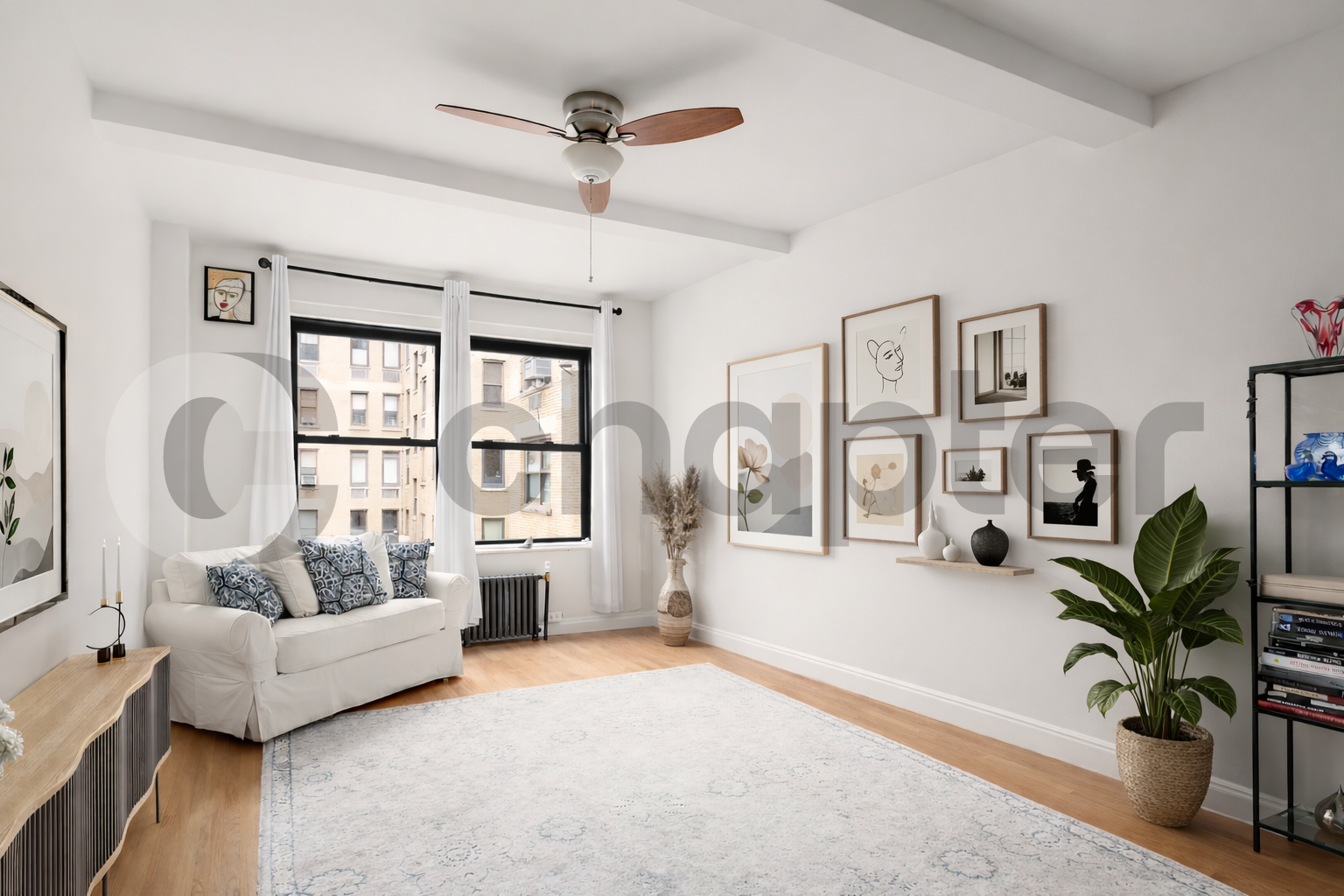 230 Central Park West, Unit 14I Manhattan, NY 10024 - Photo 5 of 17 a living room with furniture and a large window