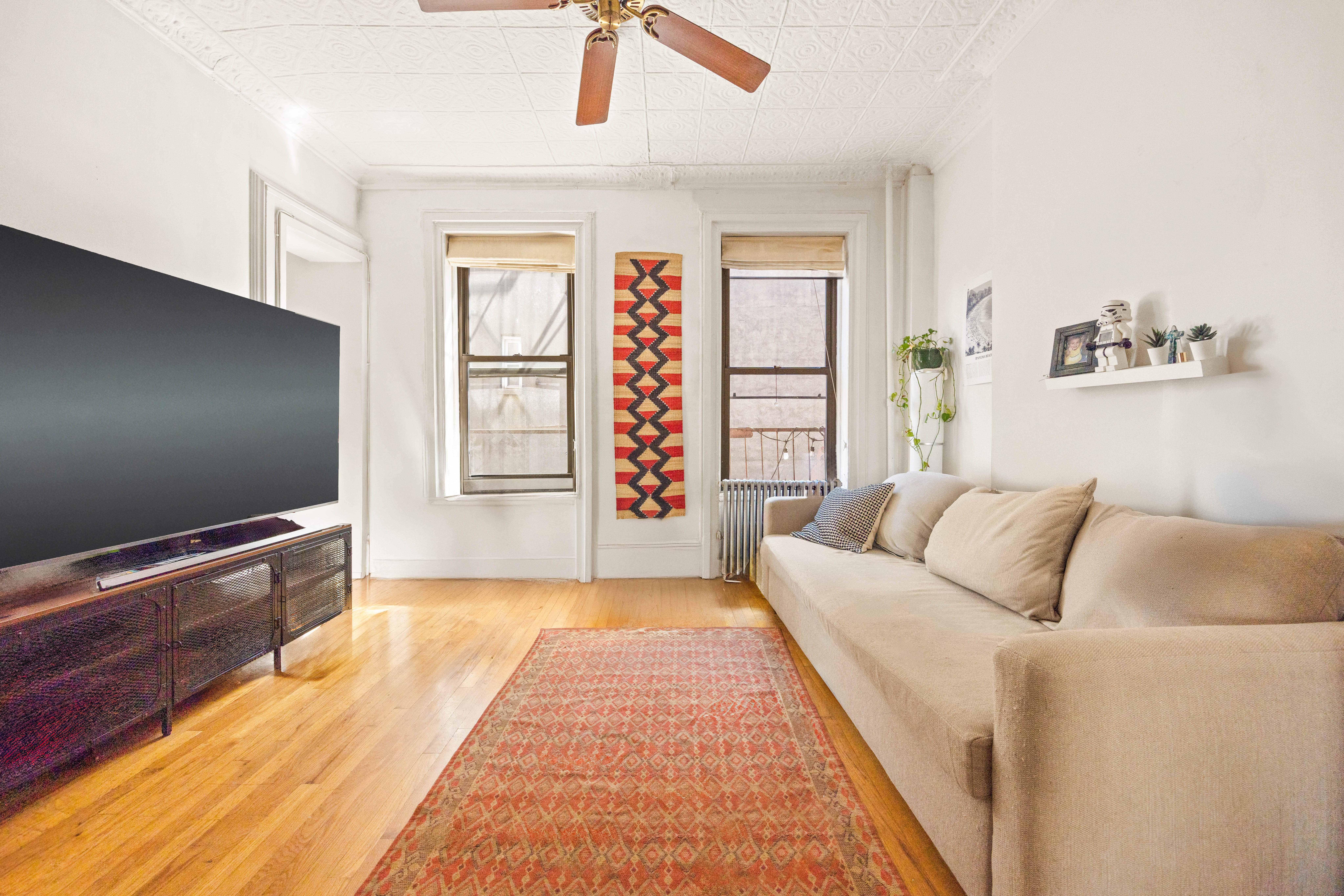 192-194 Union Street Brooklyn, NY 11231 - Photo 29 of 37 a living room with furniture and a flat screen tv