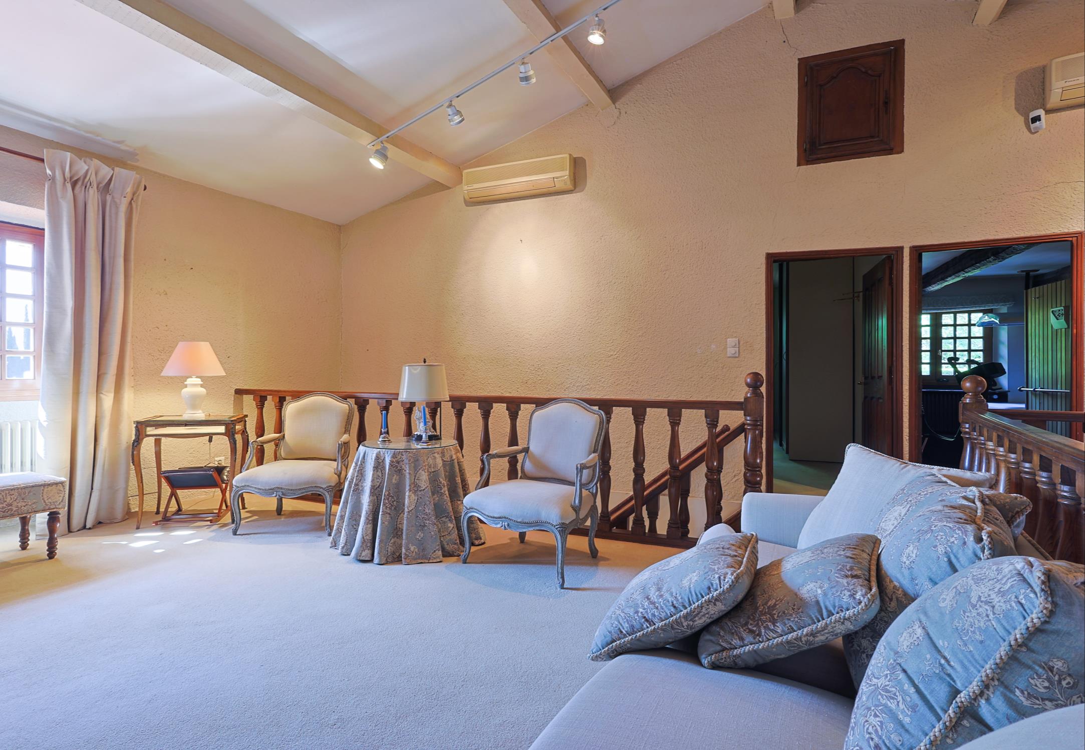 Le Vieux Moulin Provence-Alpes-Côte d’Azur, undefined 83630 - Photo 20 of 21 a living room with furniture and a flat screen tv