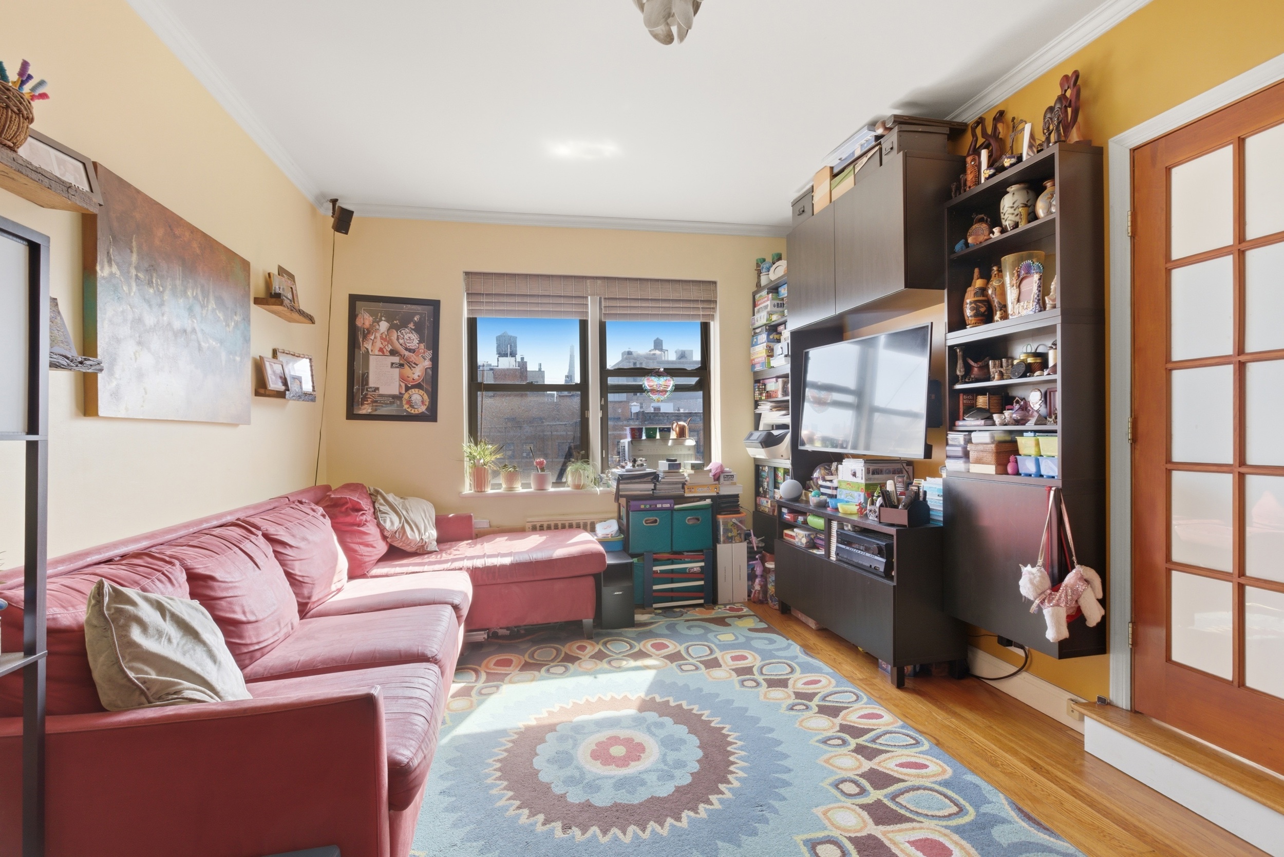 160 West 85th Street, Unit 6K Manhattan, NY 10024 - Photo 2 of 10 a living room with furniture and a rug