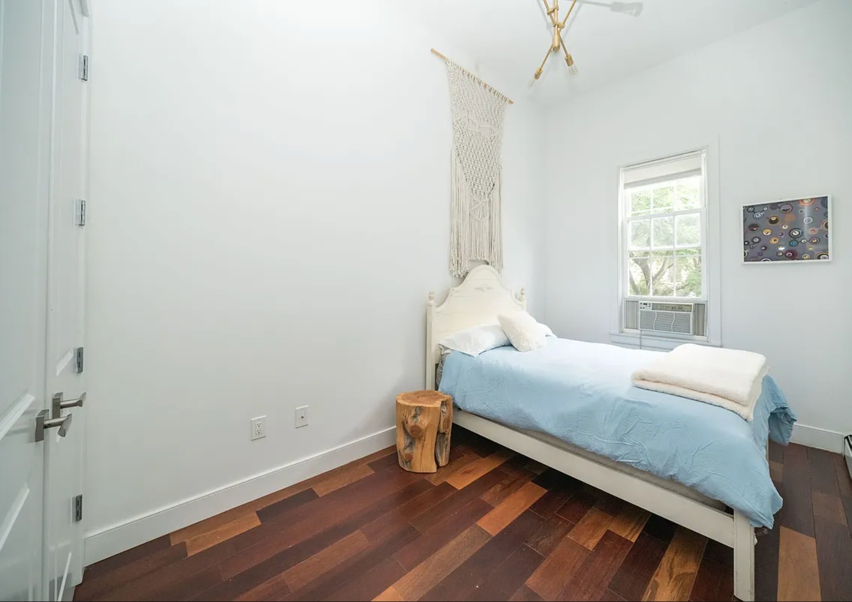 29 Melrose Street, Unit 2 Brooklyn, NY 11206 - Photo 7 of 13 a bedroom with a bed and a window