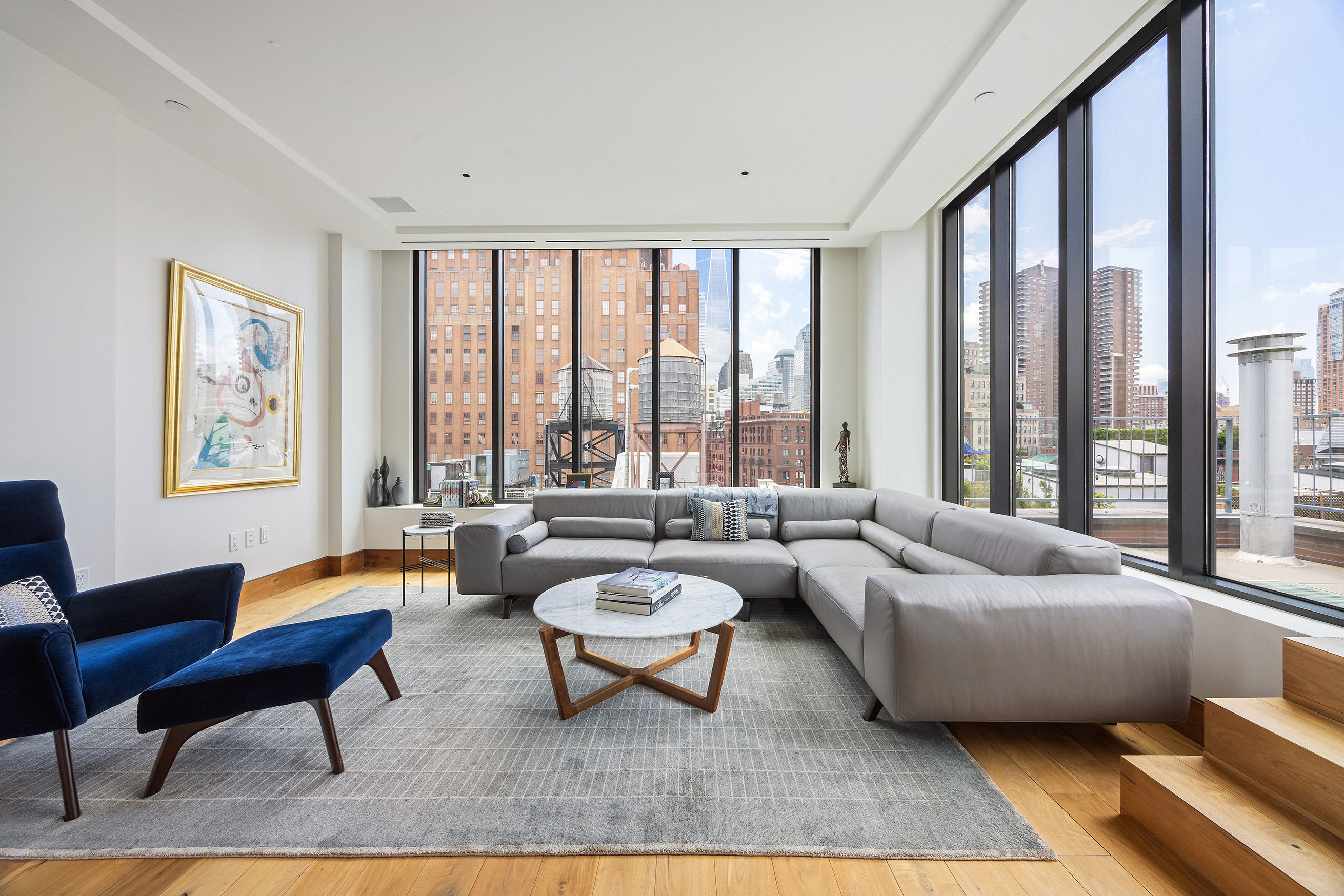 15 Leonard Street, Unit PH Manhattan, NY 10013 - Photo 4 of 37 a living room with furniture and a large window