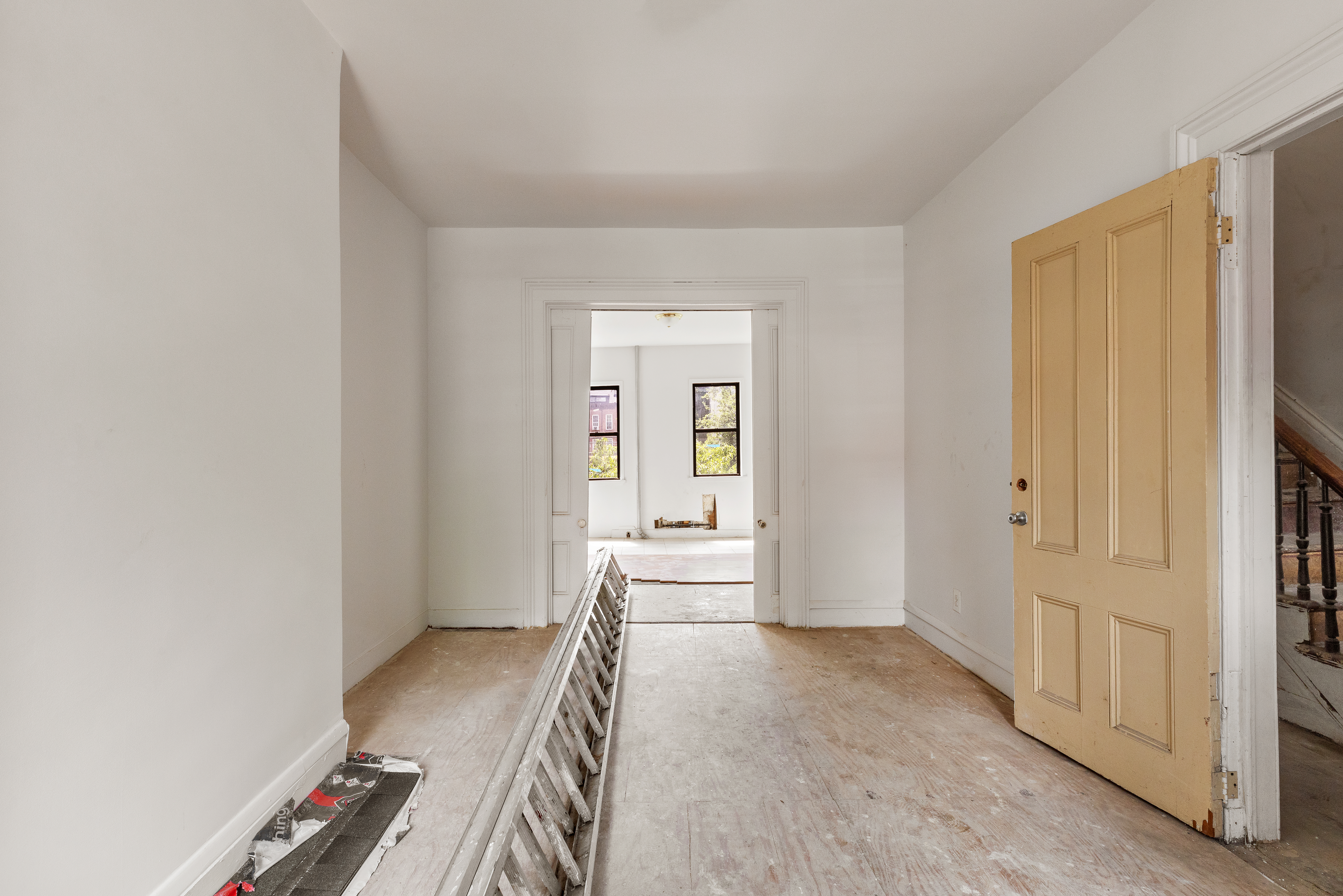 738 Lafayette Avenue Brooklyn, NY 11221 - Photo 6 of 12 a view of hallway with wooden floor