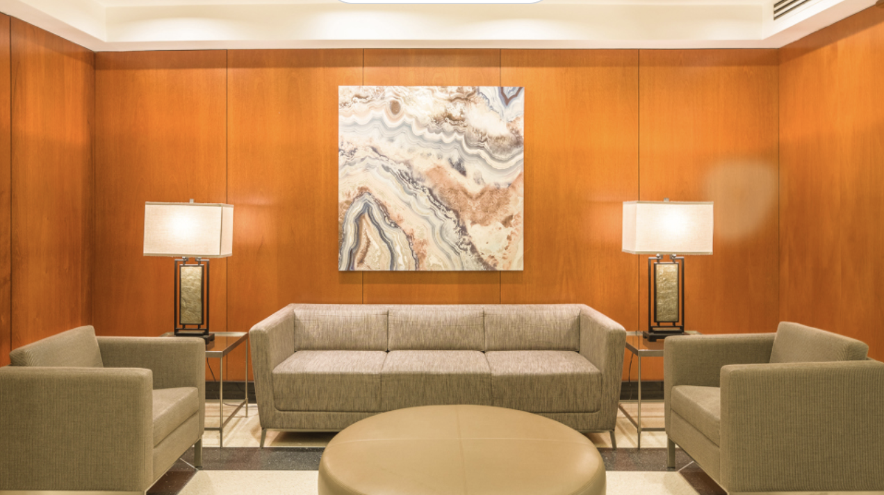 10 West 15th Street, Unit 414 Manhattan, NY 10011 - Photo 13 of 16 a living room with furniture and a lamp