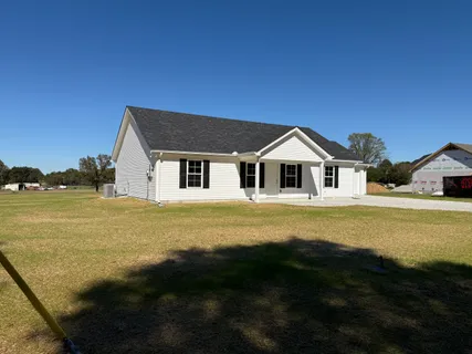 a house view with a outdoor space
