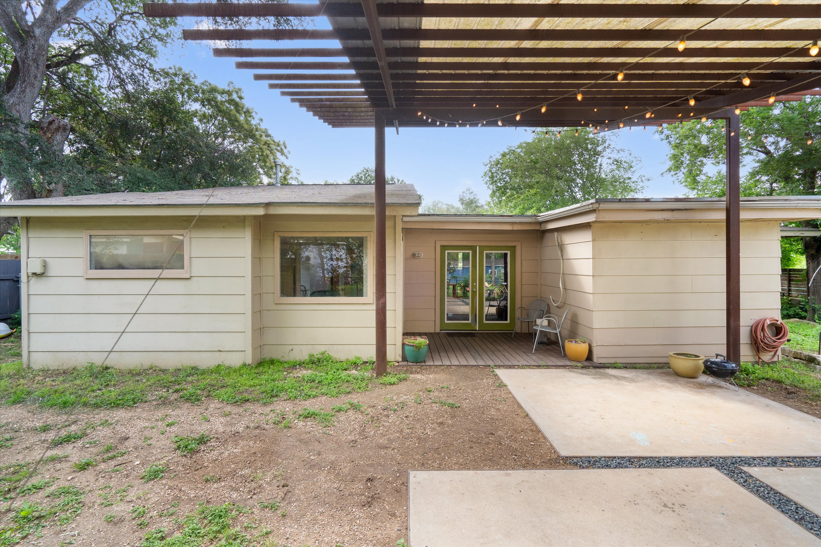 4614 Jinx Avenue Austin, TX 78745 - Photo 34 of 40 a front view of a house with a yard