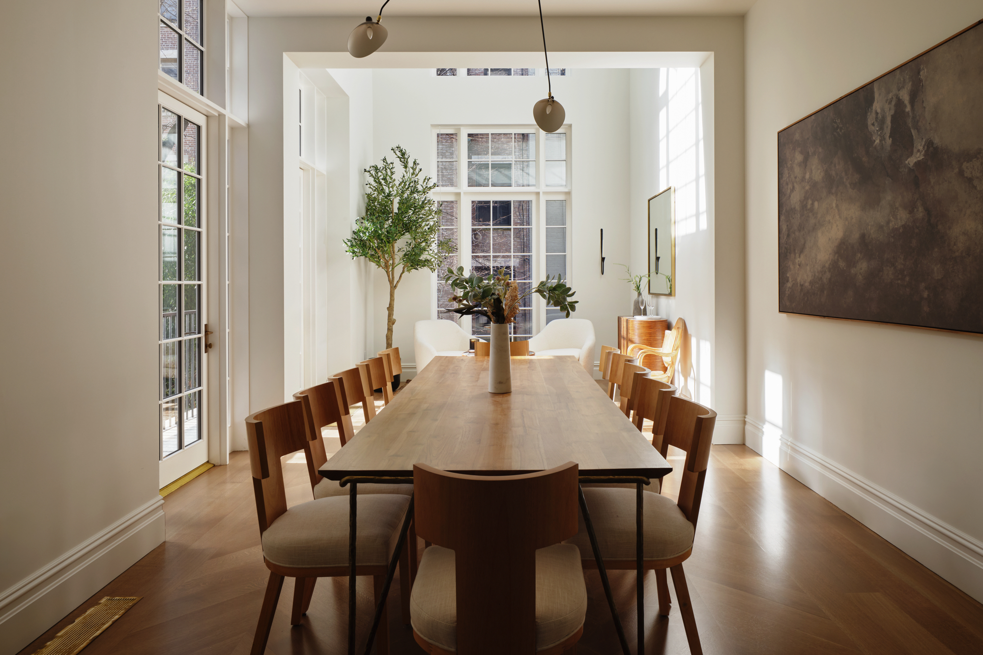 48-50 West 69th Street Manhattan, NY 10023 - Photo 6 of 33 a view of a dining room with furniture window and wooden floor