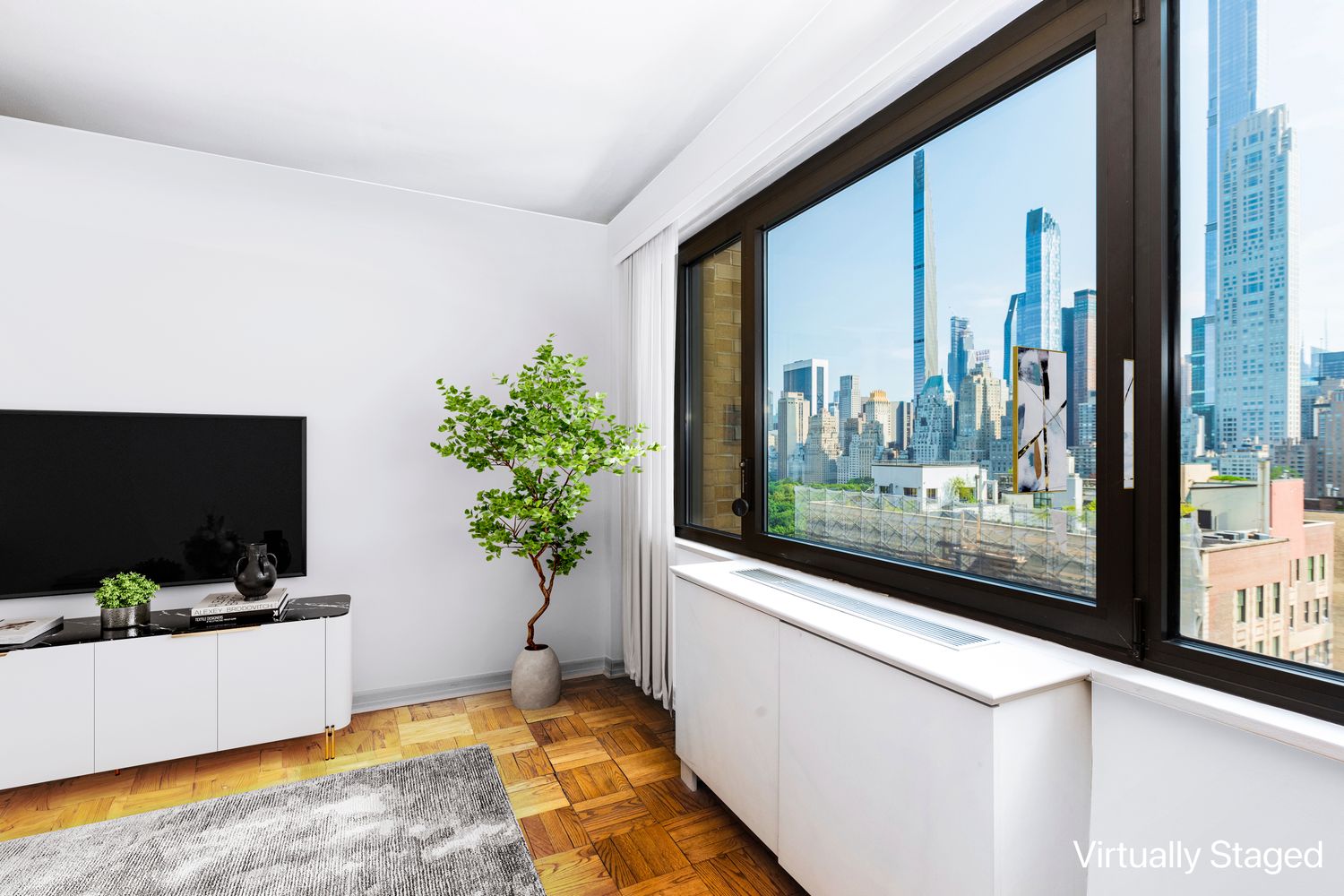 a view of a living room and a flat screen tv