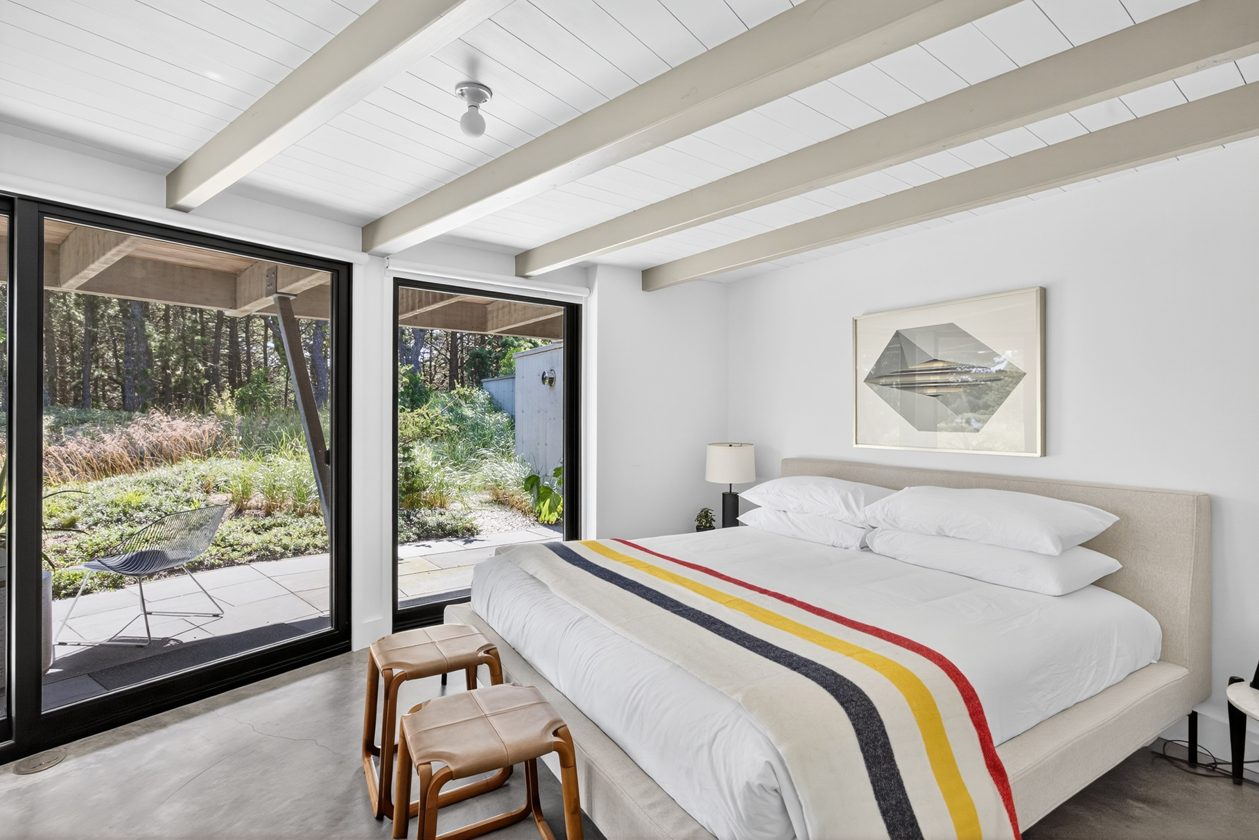 375 King Phillip Road Wellfleet, MA 02667 - Photo 15 of 27 a bedroom with a large bed and a large window