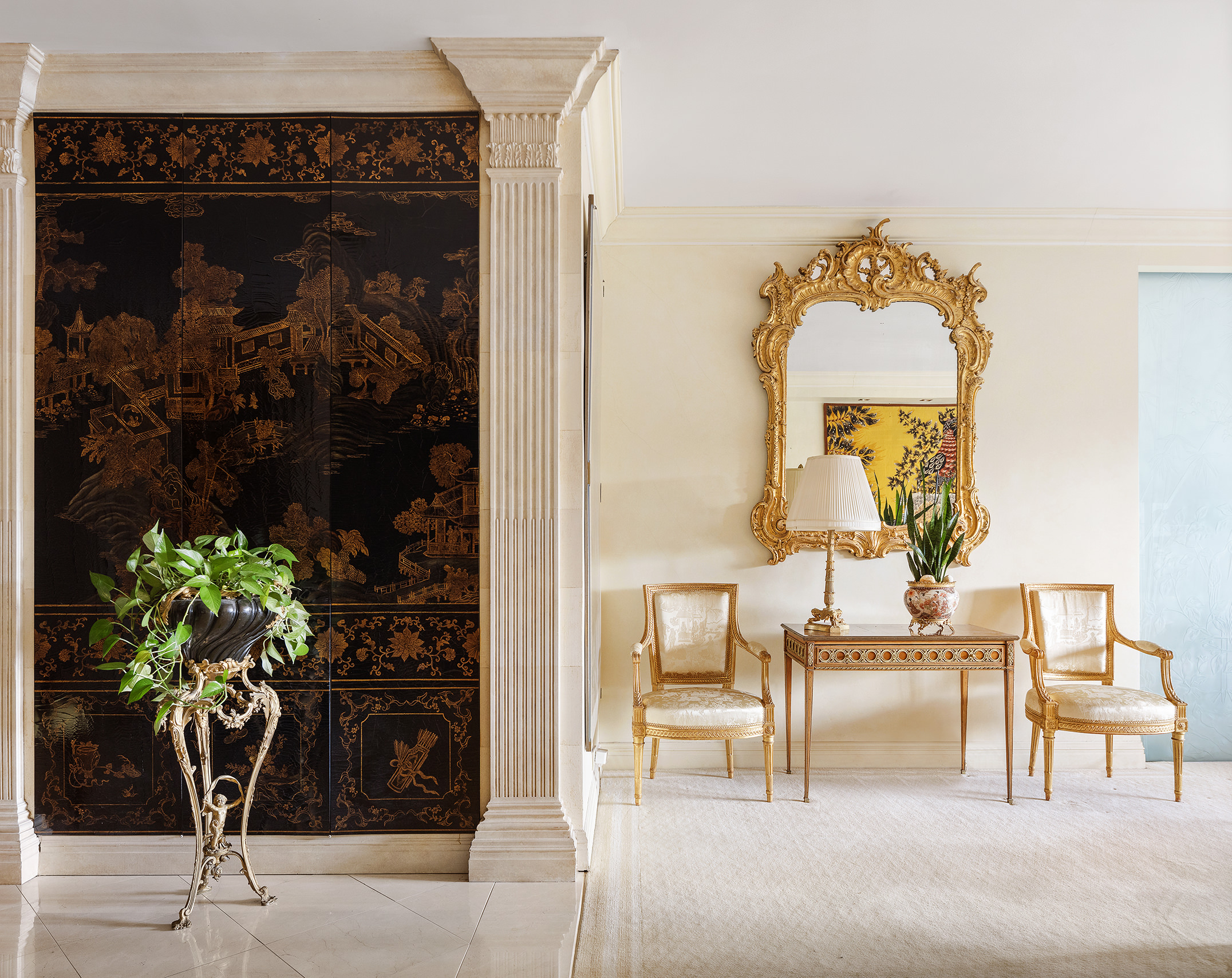 785 5th Avenue, Unit 5C Manhattan, NY 10022 - Photo 2 of 14 a living room with a potted plant
