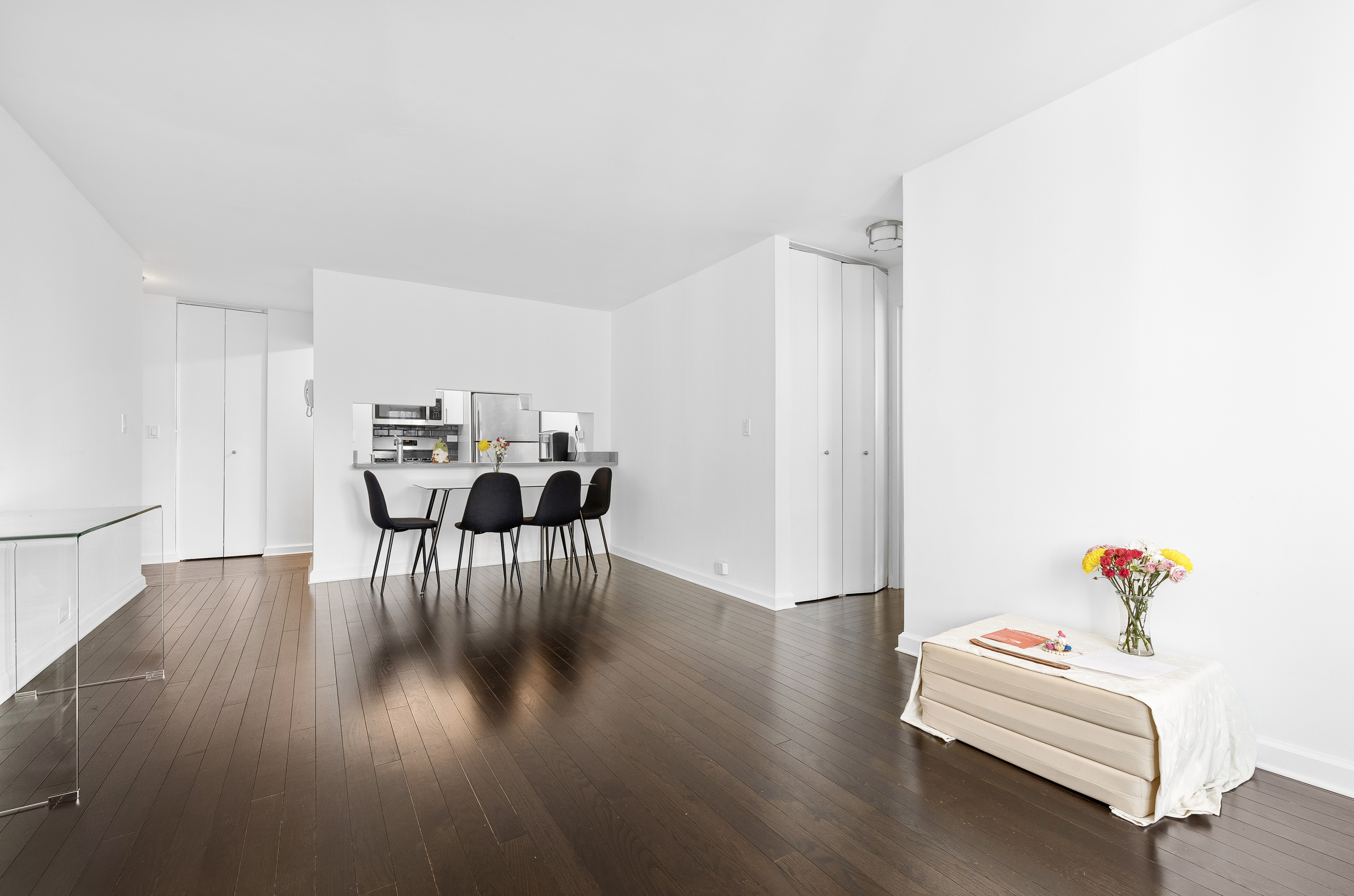 445 5th Avenue, Unit 26F Manhattan, NY 10016 - Photo 3 of 11 a dining room with furniture and wooden floor