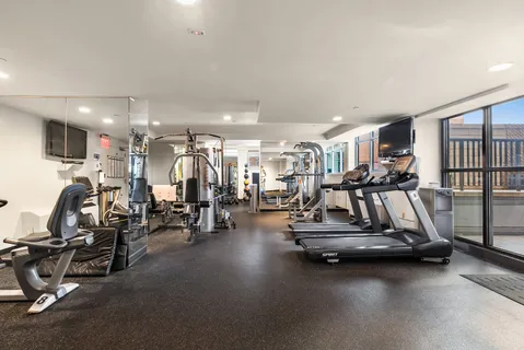 a view of a room with gym equipment