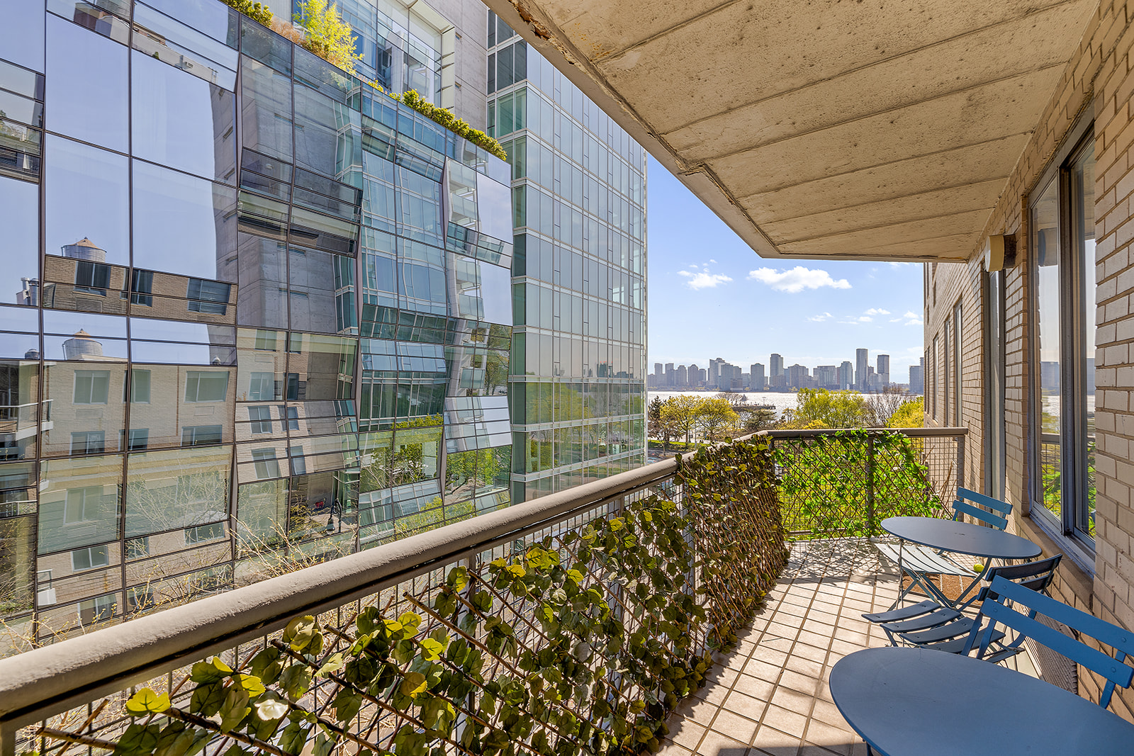 167 Perry Street, Unit 5D Manhattan, NY 10014 - Photo 3 of 18 a view of balcony with a potted plant