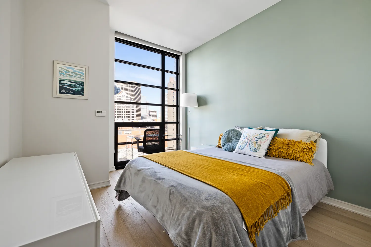 a bedroom with a bed and a closet