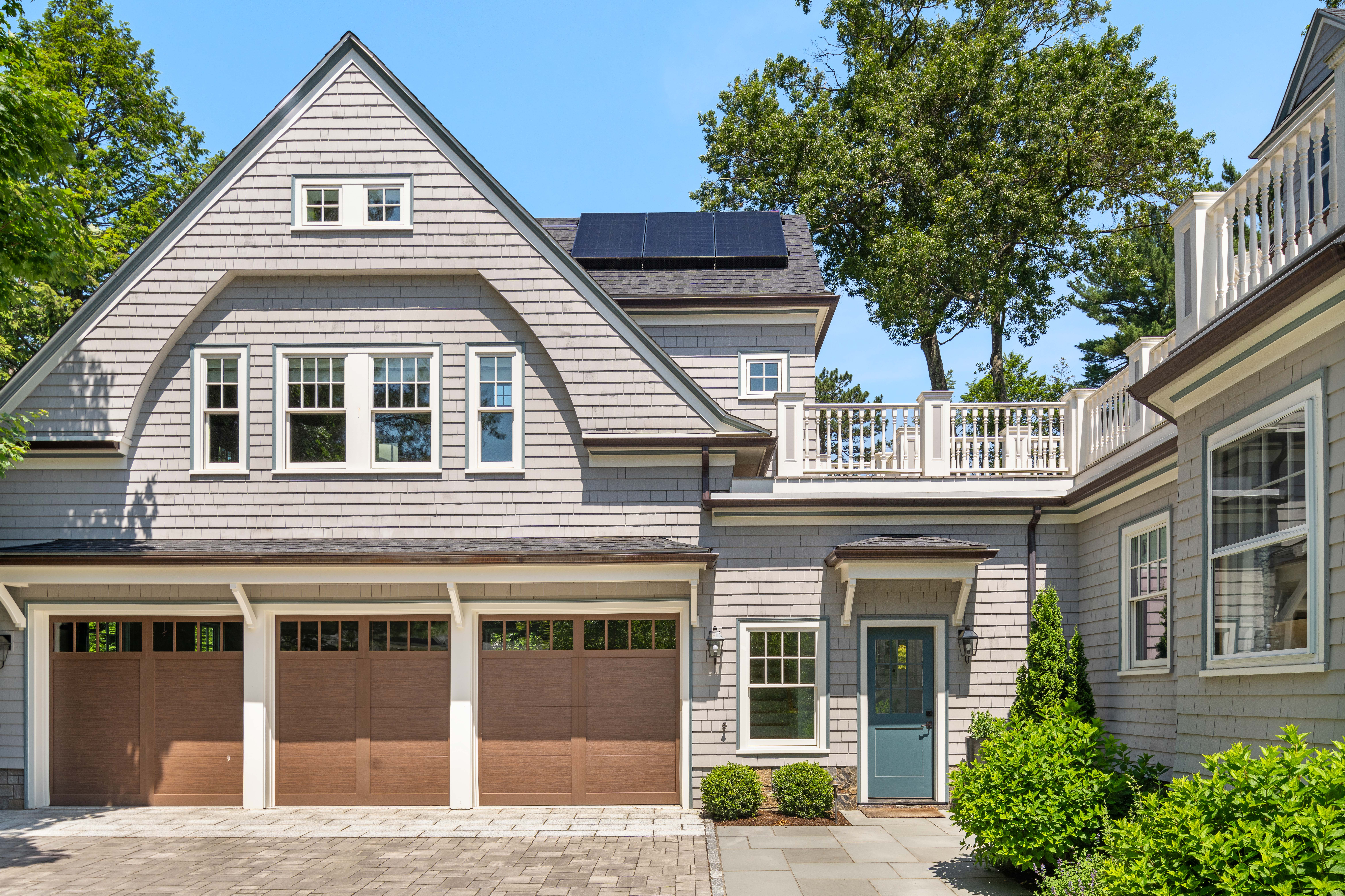 161 Pine Ridge Road Waban, MA 02468 - Photo 7 of 8 a view of a white house with large windows
