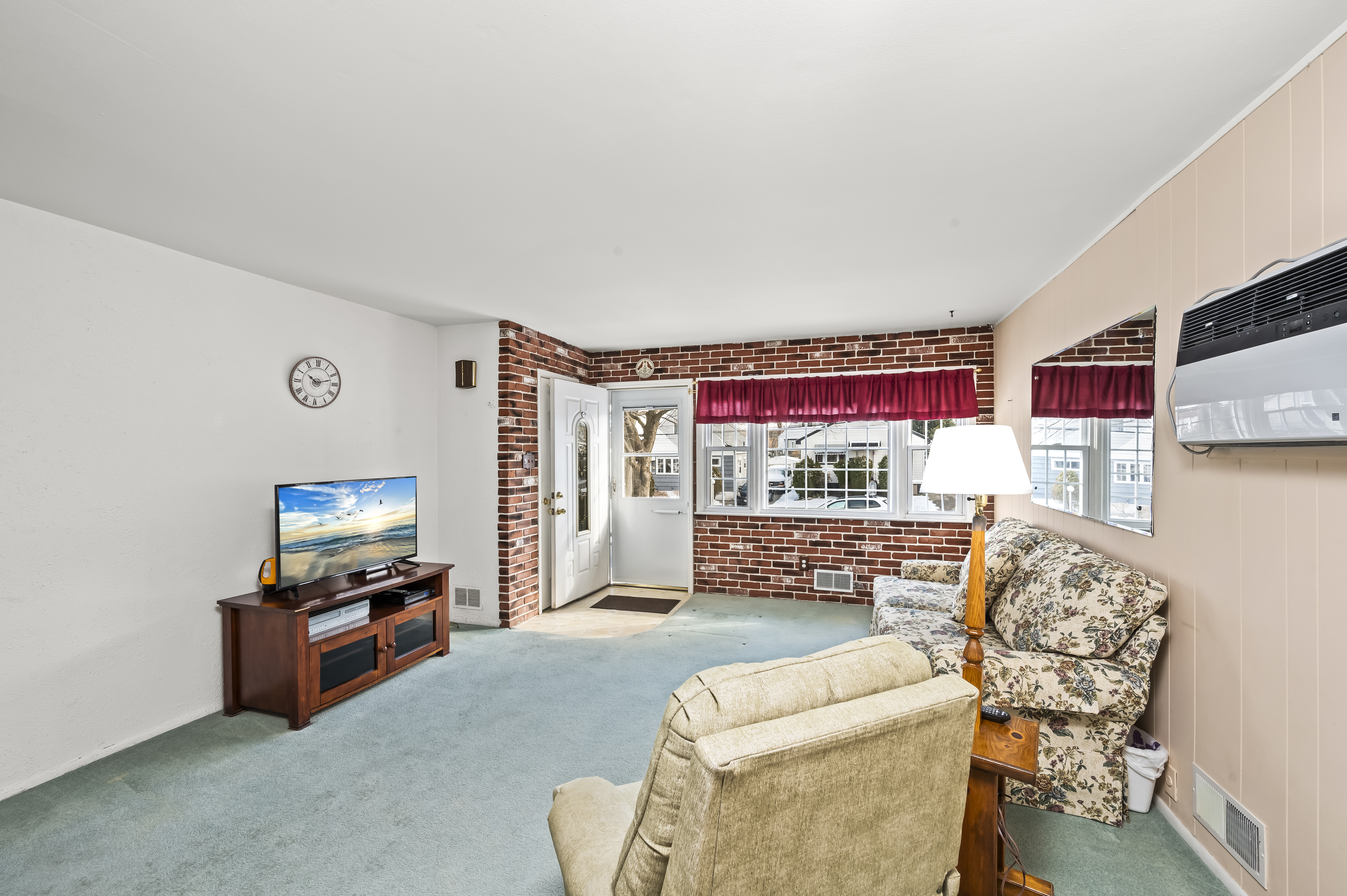 15 Area Place Staten Island, NY 10314 - Photo 6 of 27 a living room with furniture and a flat screen tv
