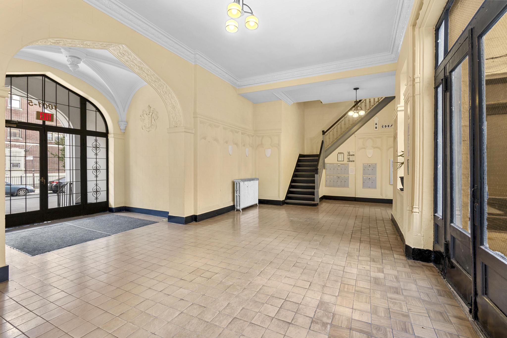 1001 President Street, Unit L2 Brooklyn, NY 11225 - Photo 2 of 3 a view of an empty room with stairs