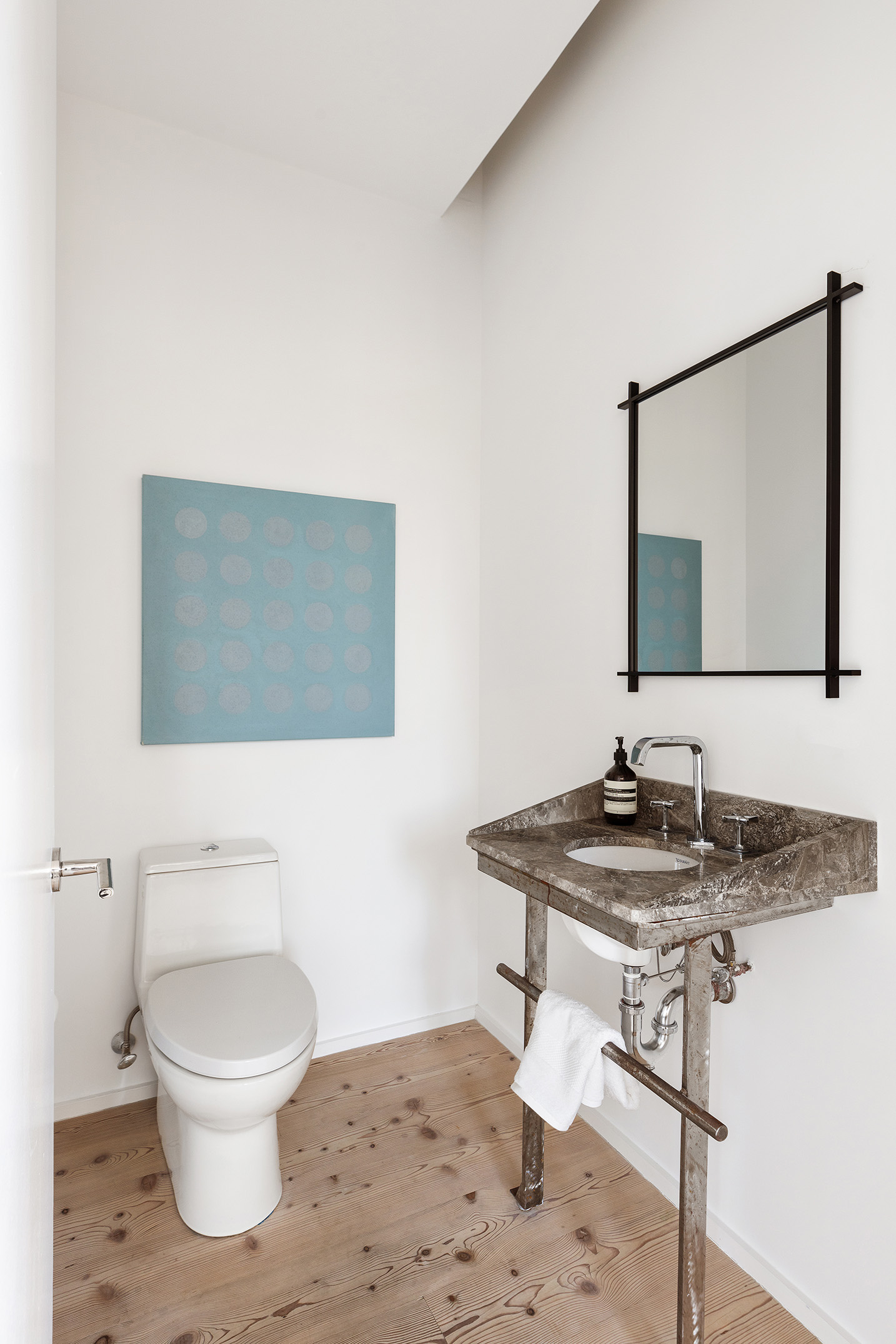 100 Franklin Street, Unit PHS Manhattan, NY 10013 - Photo 27 of 35 a bathroom with a toilet a sink and mirror