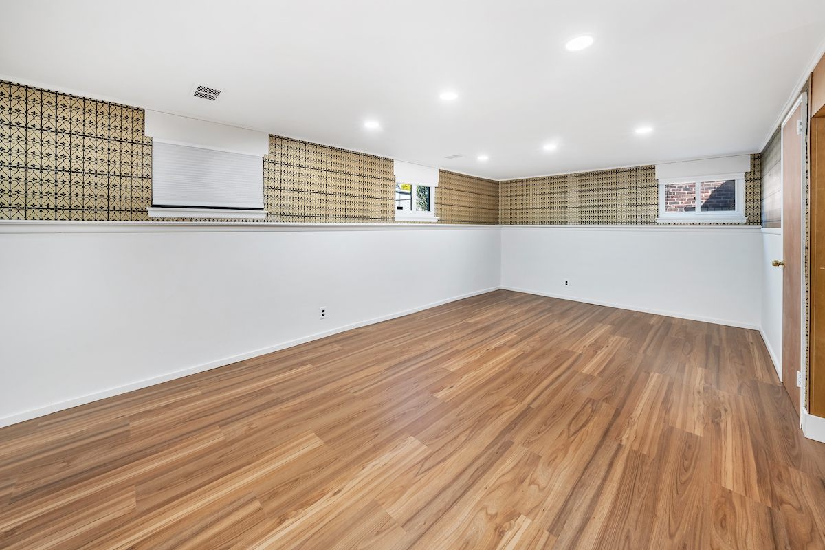 16-08 202nd Street Queens, NY 11360 - Photo 10 of 13 a view of empty room with wooden floor