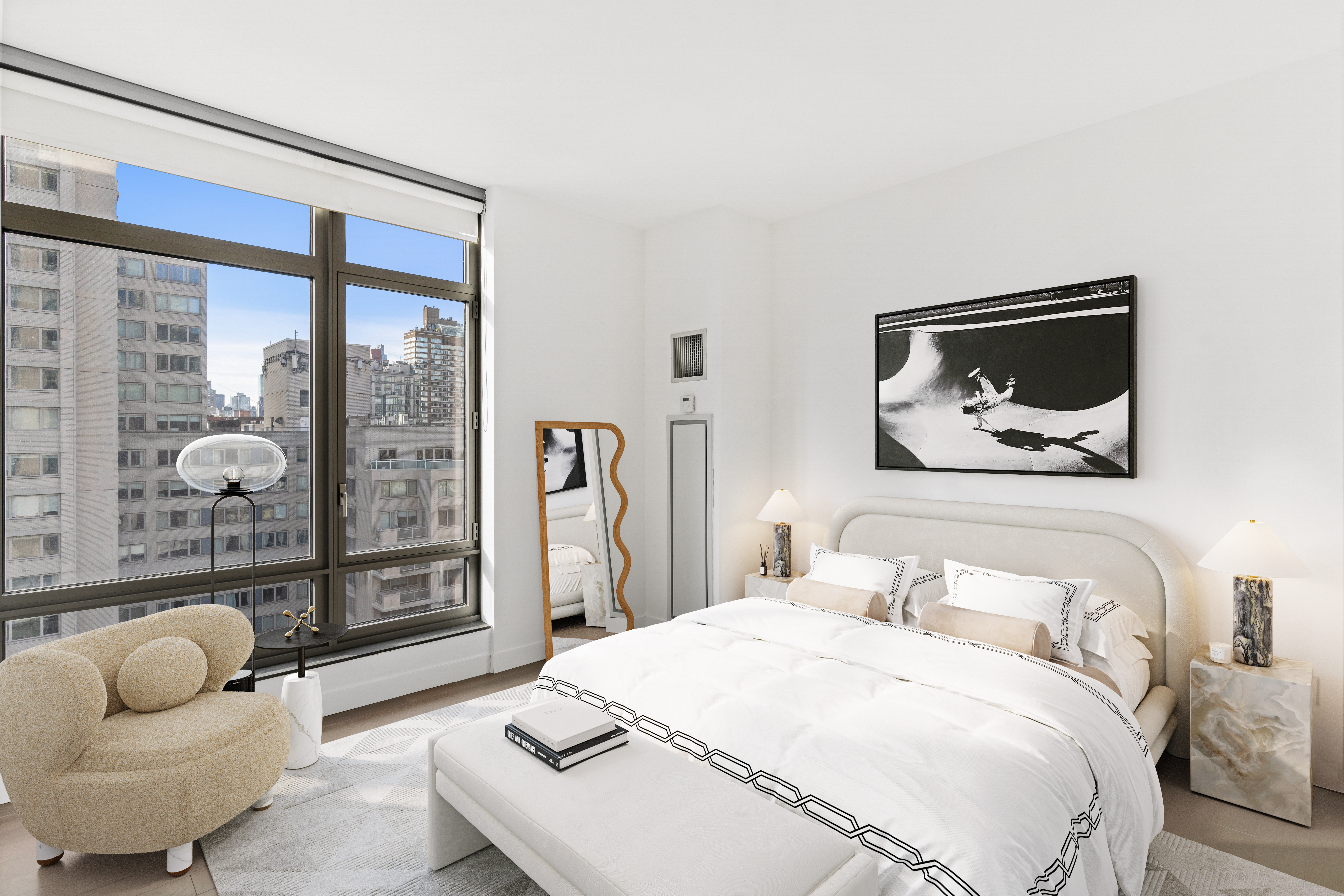 450 East 83rd Street, Unit 9E Manhattan, NY 10028 - Photo 9 of 18 a bedroom with a bed and glass door