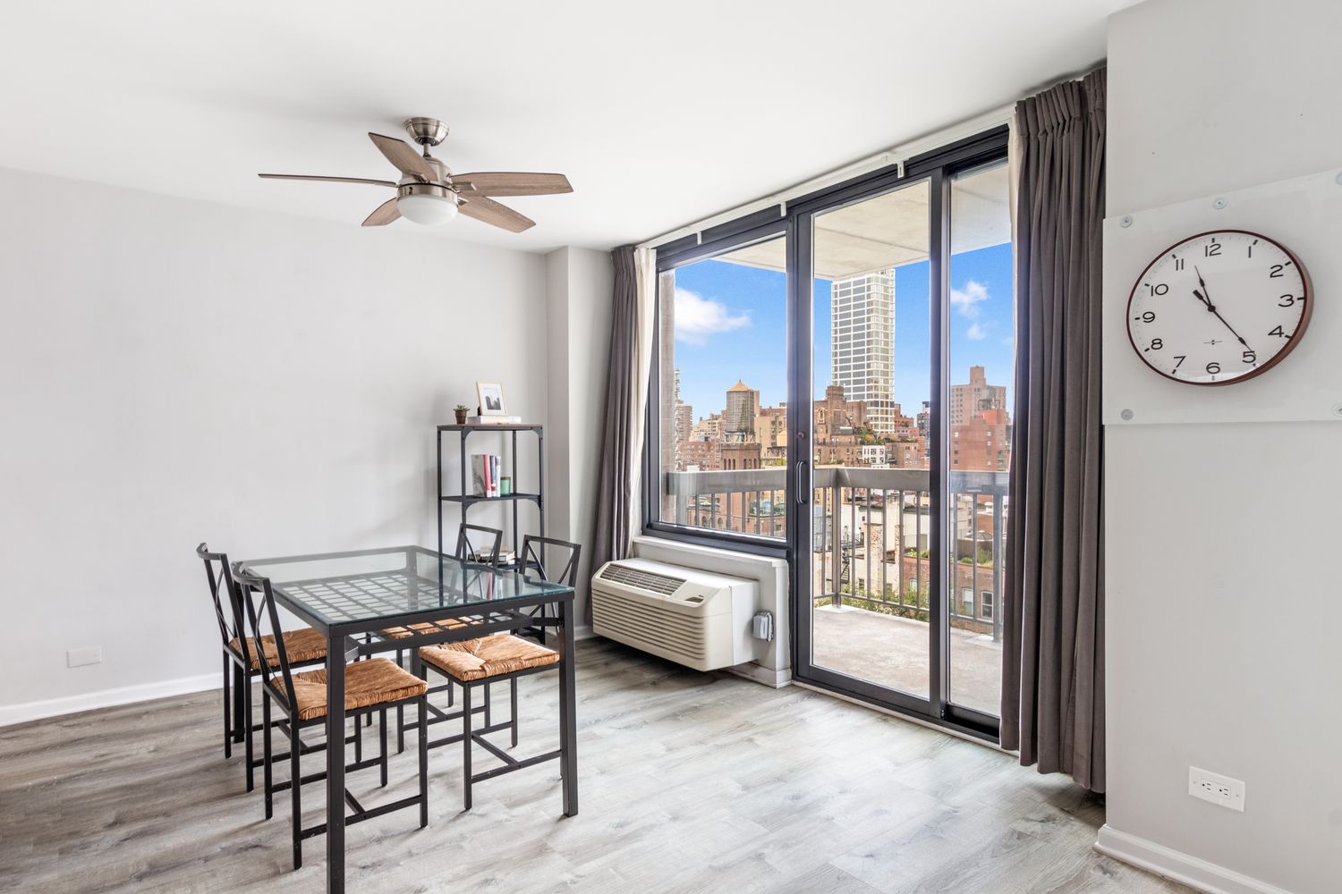 111 East 30th Street, Unit 14A Manhattan, NY 10016 - Photo 5 of 16 a living room with furniture and a large window