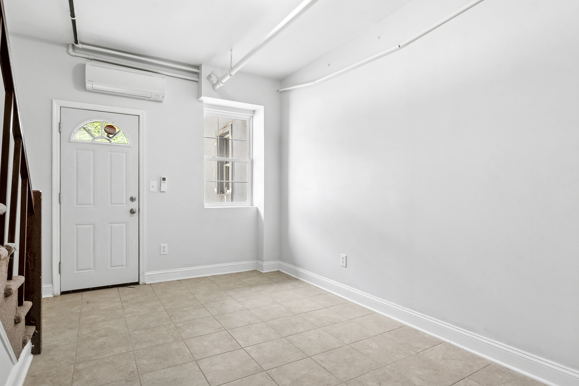 41-05 20th Avenue Queens, NY 11105 - Photo 18 of 20 an empty room with windows