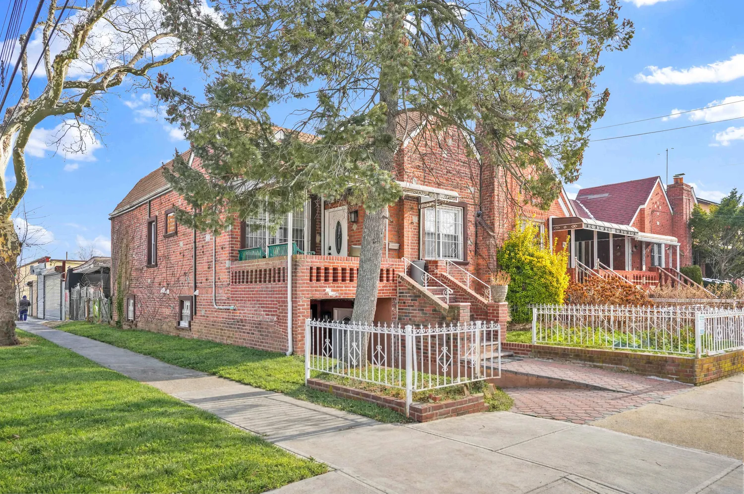 a view of a brick building with many windows