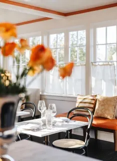 a dining room with furniture