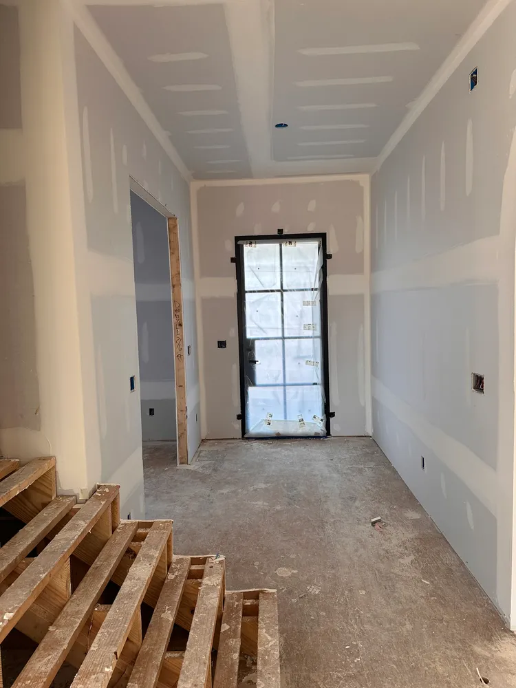 an empty room with windows