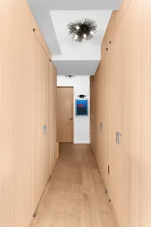 a view of a hallway with closet