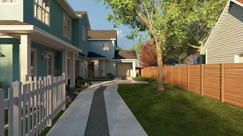 a view of a house with a small yard and wooden fence