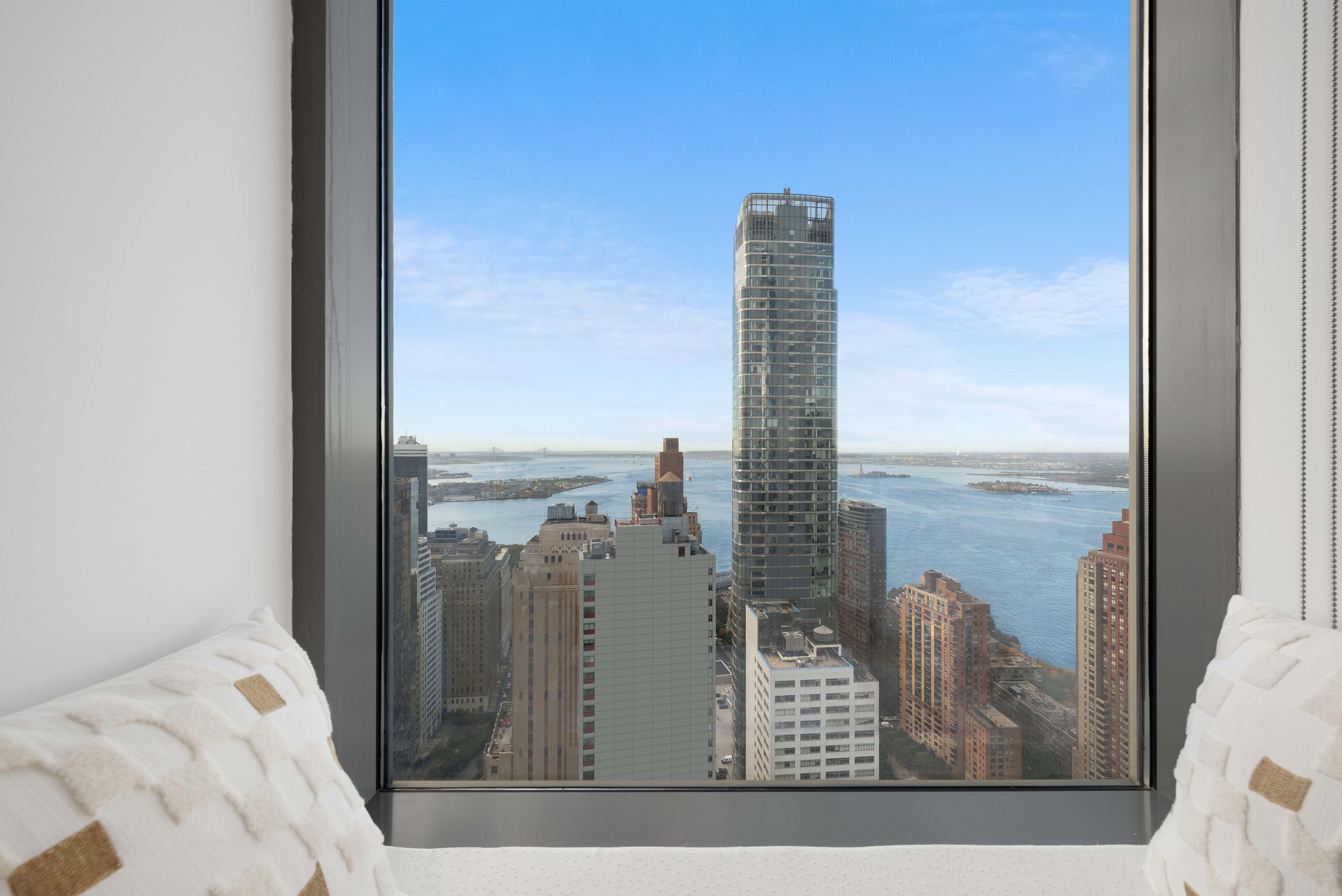 123 Washington Street, Unit 49G Manhattan, NY 10006 - Photo 6 of 11 a view of a balcony with floor to ceiling window