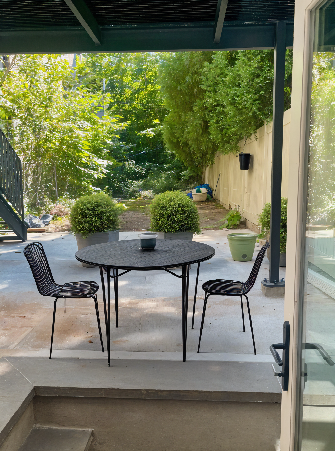 978 Bergen Street, Unit GARDEN Brooklyn, NY 11216 - Photo 1 of 15 a view of balcony with furniture and a yard