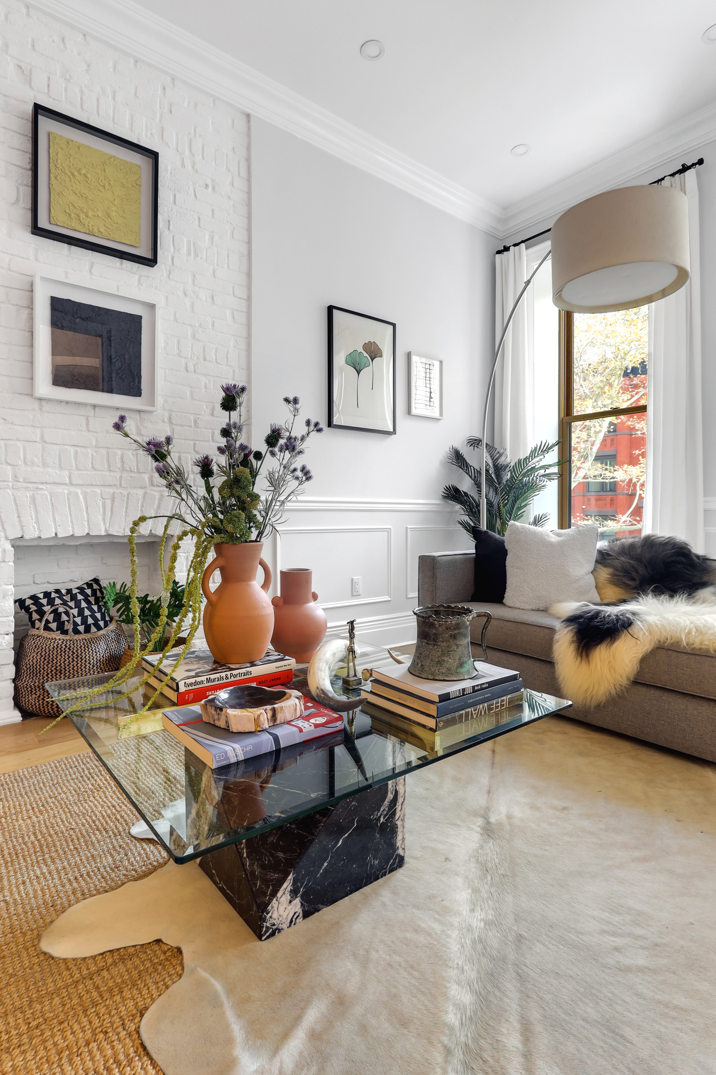 220 Lewis Avenue Brooklyn, NY 11221 - Photo 3 of 22 a living room with furniture and a flat screen tv