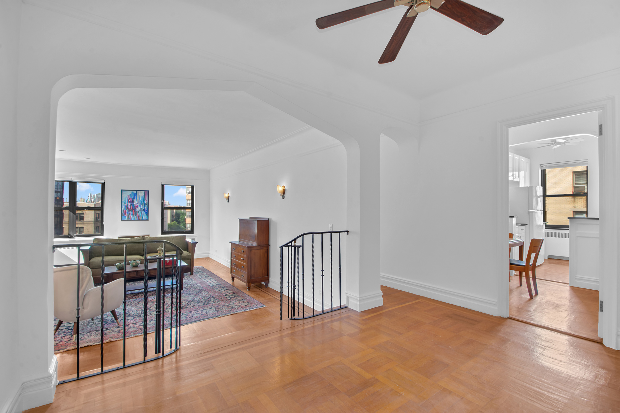 200 Pinehurst Avenue, Unit 5C Manhattan, NY 10033 - Photo 7 of 17 a view of livingroom with furniture and window