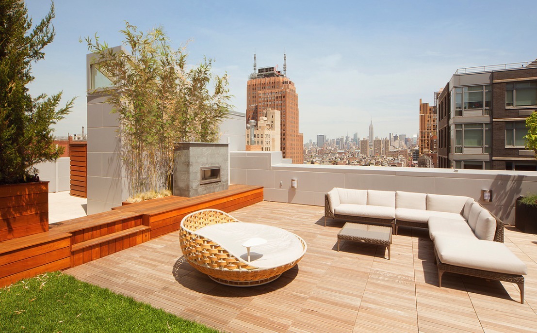 93 Worth Street, Unit 406 Manhattan, NY 10013 - Photo 9 of 11 a outdoor living space with furniture and a fireplace