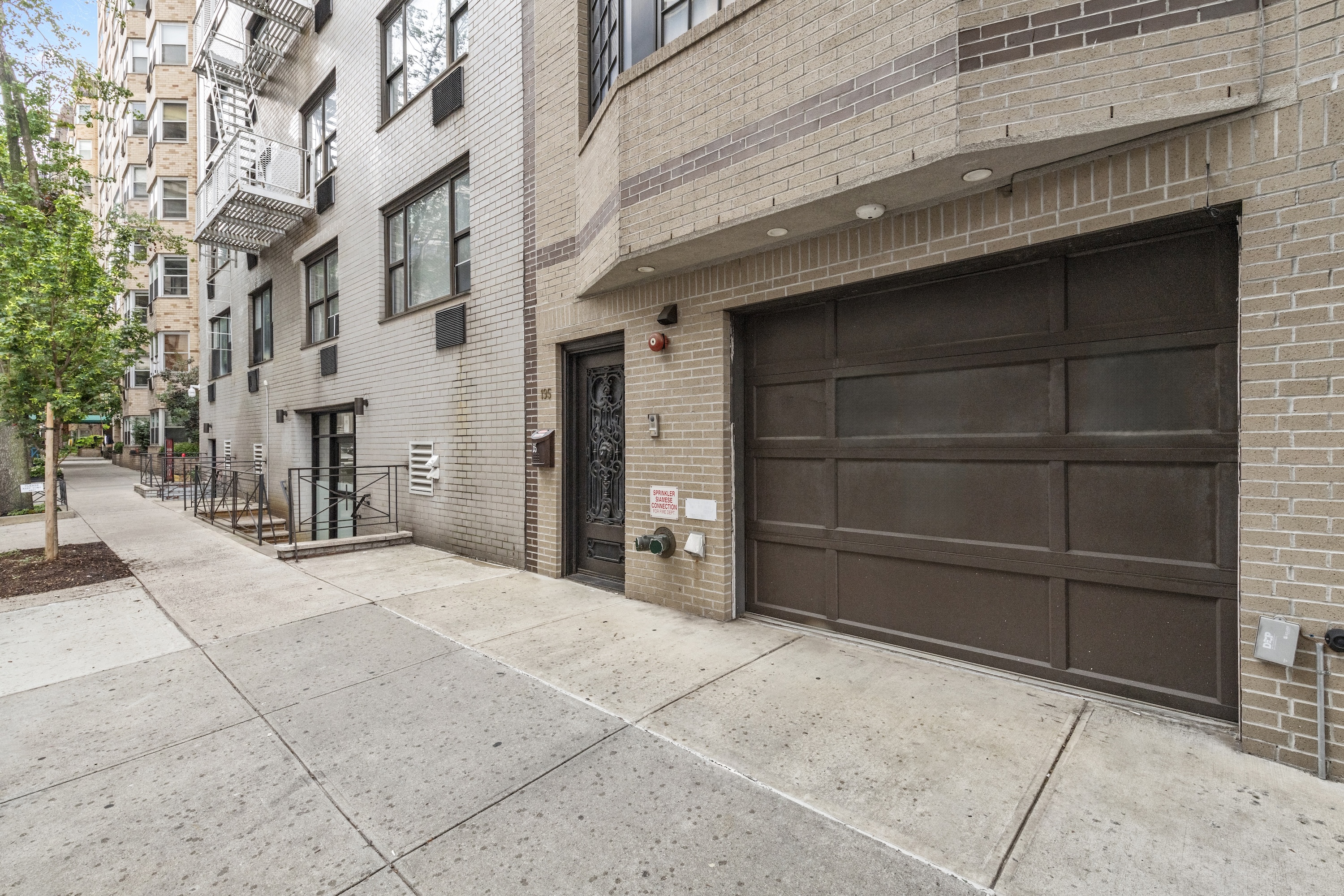 195 East 76th Street Manhattan, NY 10021 - Photo 2 of 20 a view of a car garage
