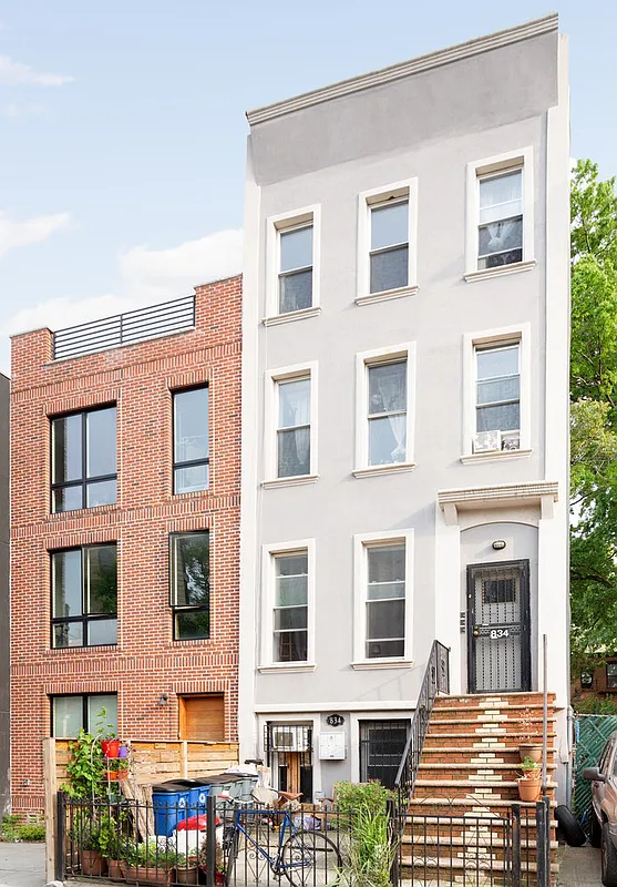 834 Halsey Street, Unit 2 Brooklyn, NY 11233 - Photo 8 of 10 a large building with a lot of windows