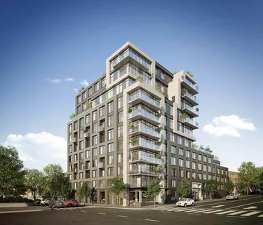 a view of a building with a street