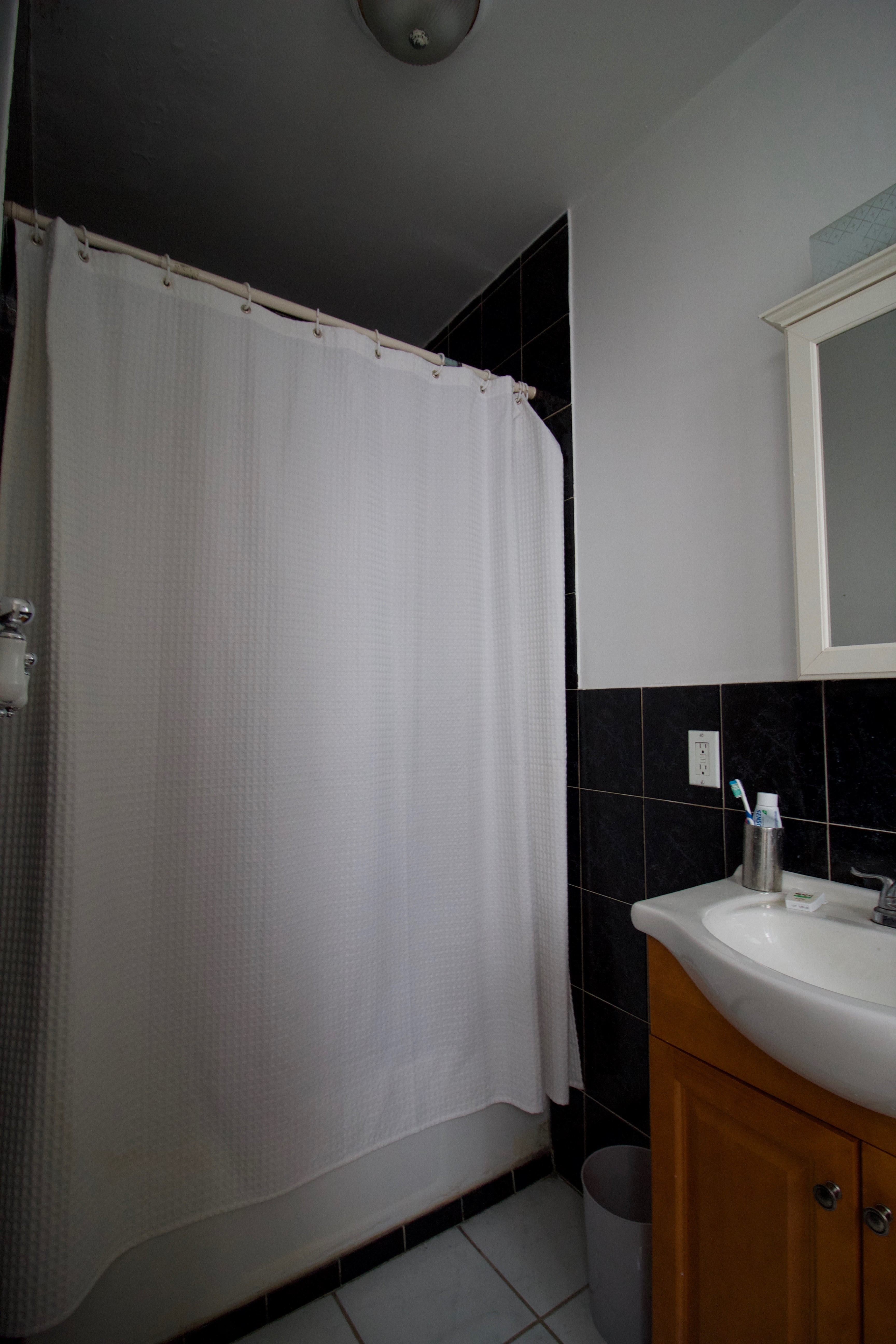 55 Duffield Street, Unit 3 Brooklyn, NY 11201 - Photo 14 of 14 a bathroom with a sink and mirror
