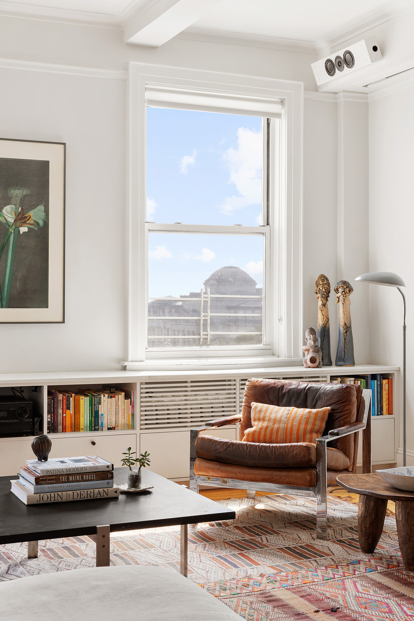41 Eastern Parkway, Unit 11E Brooklyn, NY 11238 - Photo 5 of 14 a living room with furniture and a window