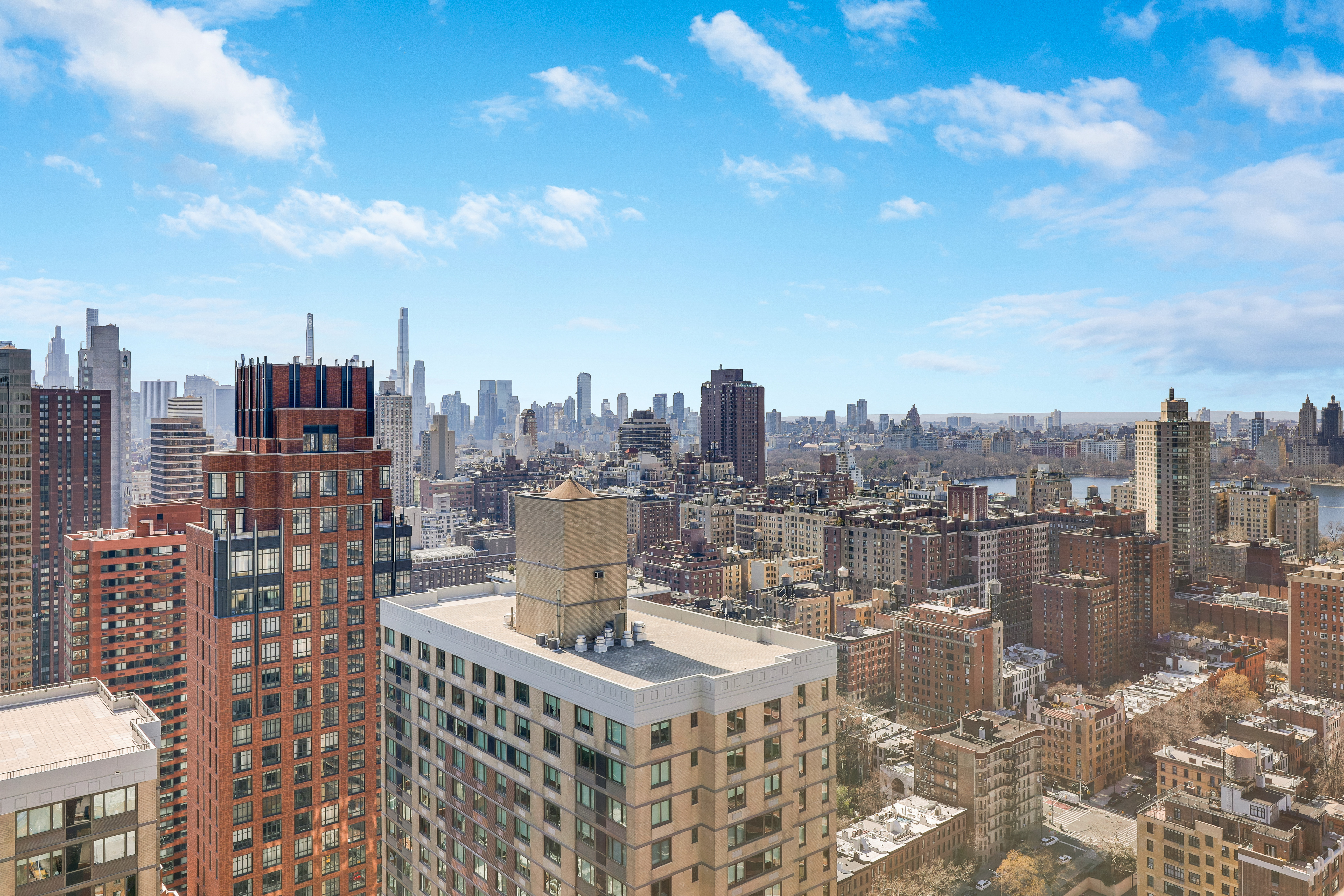 215-217 East 96th Street, Unit 25K Manhattan, NY 10128 - Photo 13 of 16 a view of a city with tall buildings