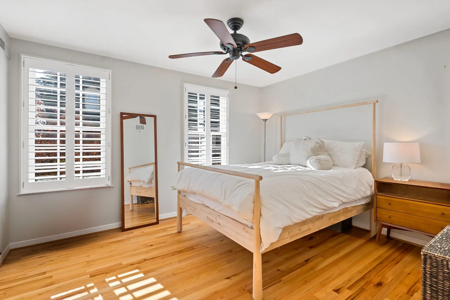 a bed room with a bed and a window