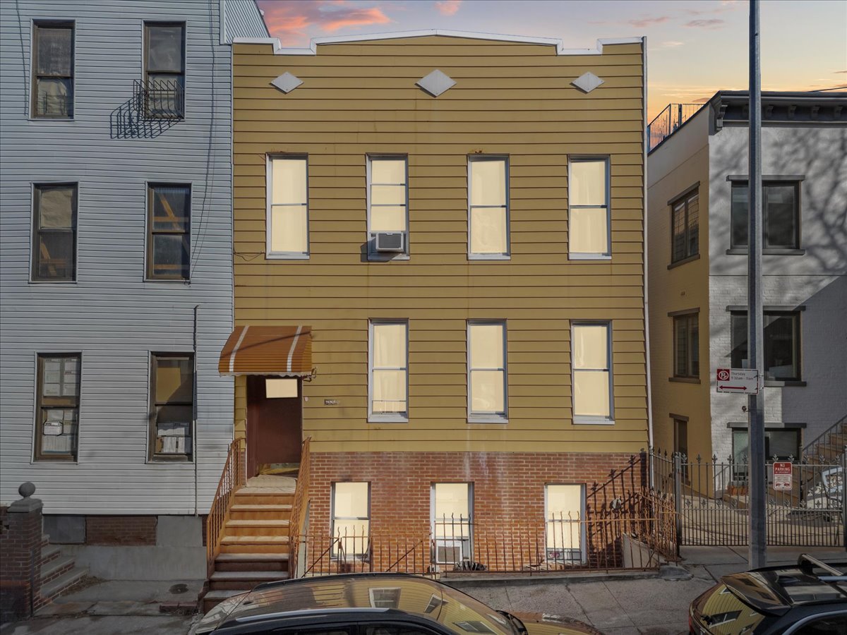 335 21st Street Brooklyn, NY 11215 - Photo 9 of 11 a front view of a building with many windows